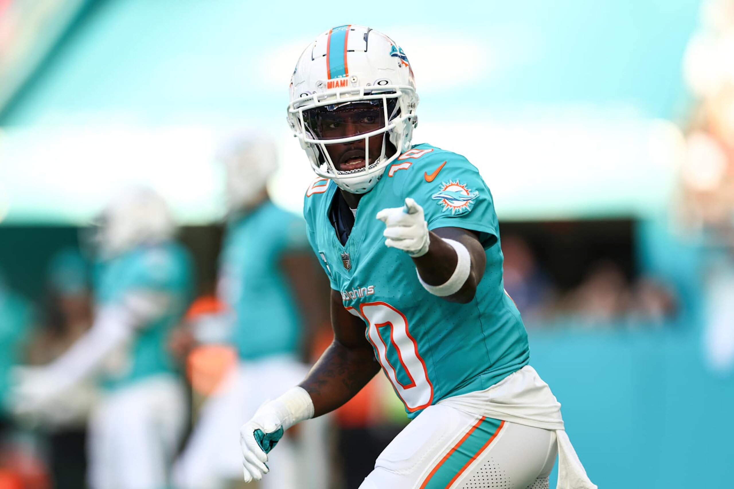 MIAMI GARDENS, FLORIDA - DECEMBER 22: Tyreek Hill #10 of the Miami Dolphins gets set during the first half of an NFL football game against the San Francisco 49ers at Hard Rock Stadium on December 22, 2024 in Miami Gardens, Florida. (Photo by Kevin Sabitus/Getty Images)