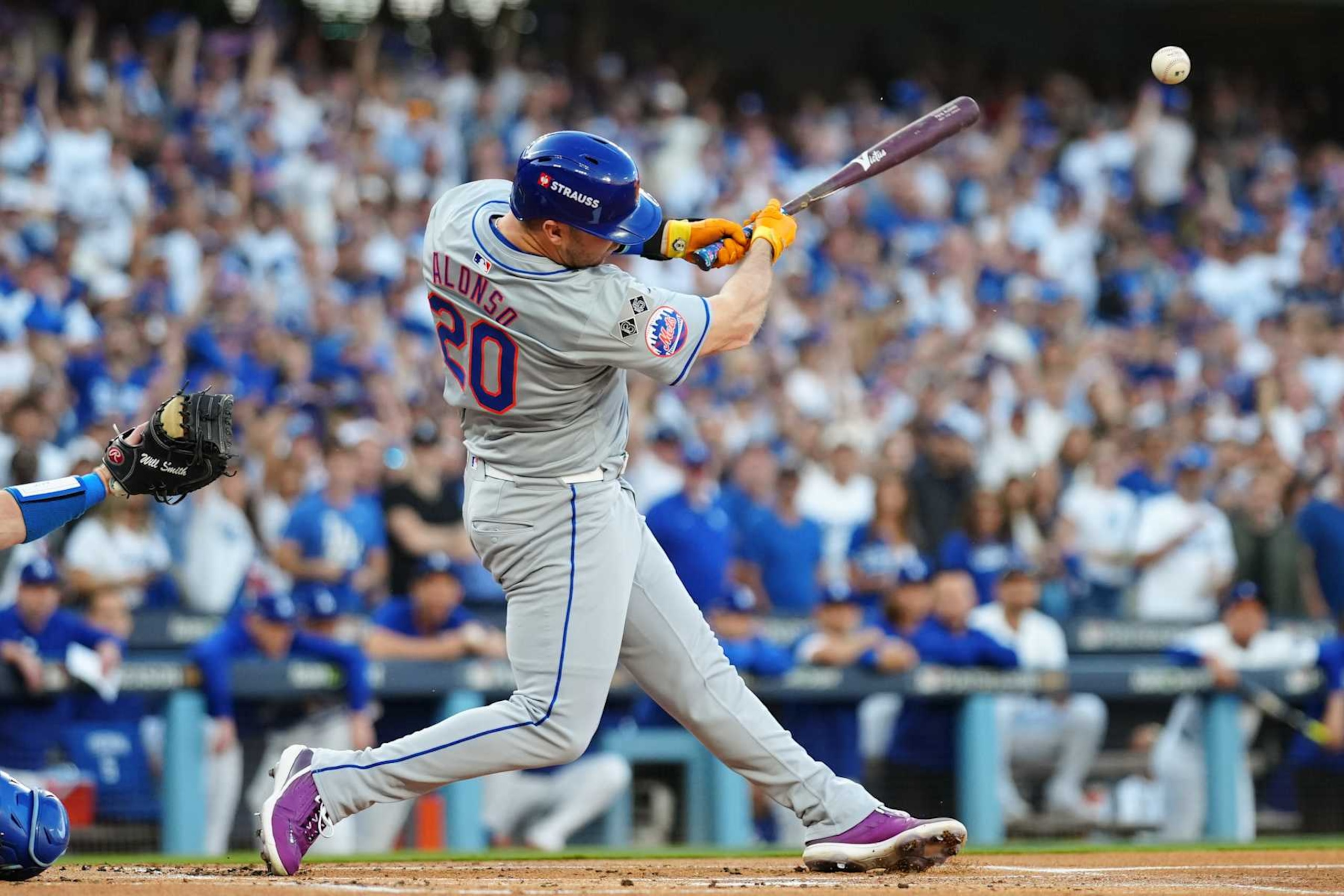 LOS ANGELES, CA - OCTOBER 20:   Pete Alonso #20 of the New York Mets hits a one RBI single in the first inning during Game 6 of the NLCS presented by loanDepot between the New York Mets and the Los Angeles Dodgers at Dodger Stadium on Sunday, October 20, 2024 in Los Angeles, California. (Photo by Daniel Shirey/MLB Photos via Getty Images)