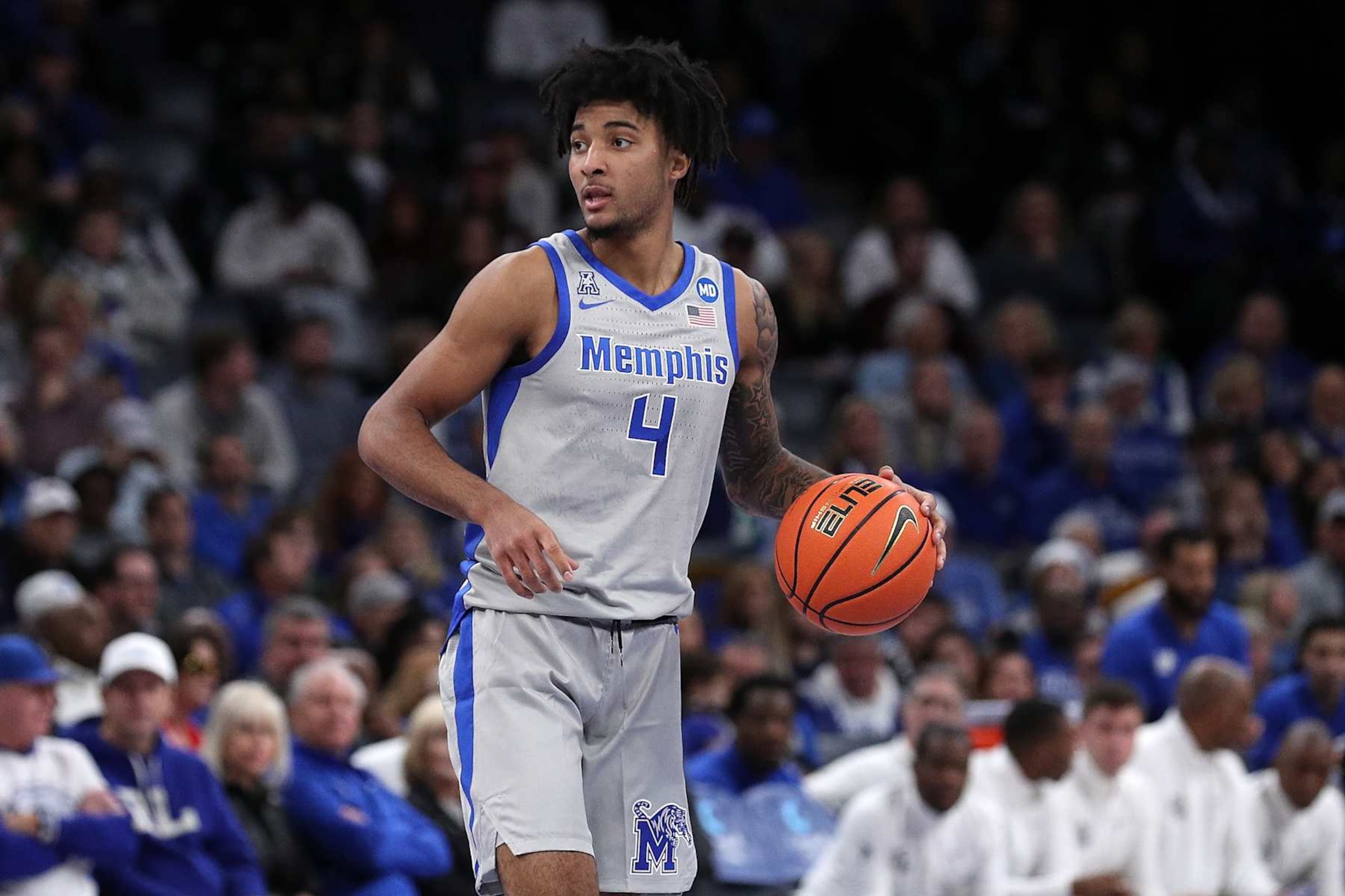 MEMPHIS, TENNESSEE - DECEMBER 21: PJ Haggerty #4 of the Memphis Tigers handles the ball during the game against the Mississippi State Bulldogs at FedExForum on December 21, 2024 in Memphis, Tennessee. (Photo by Justin Ford/Getty Images)