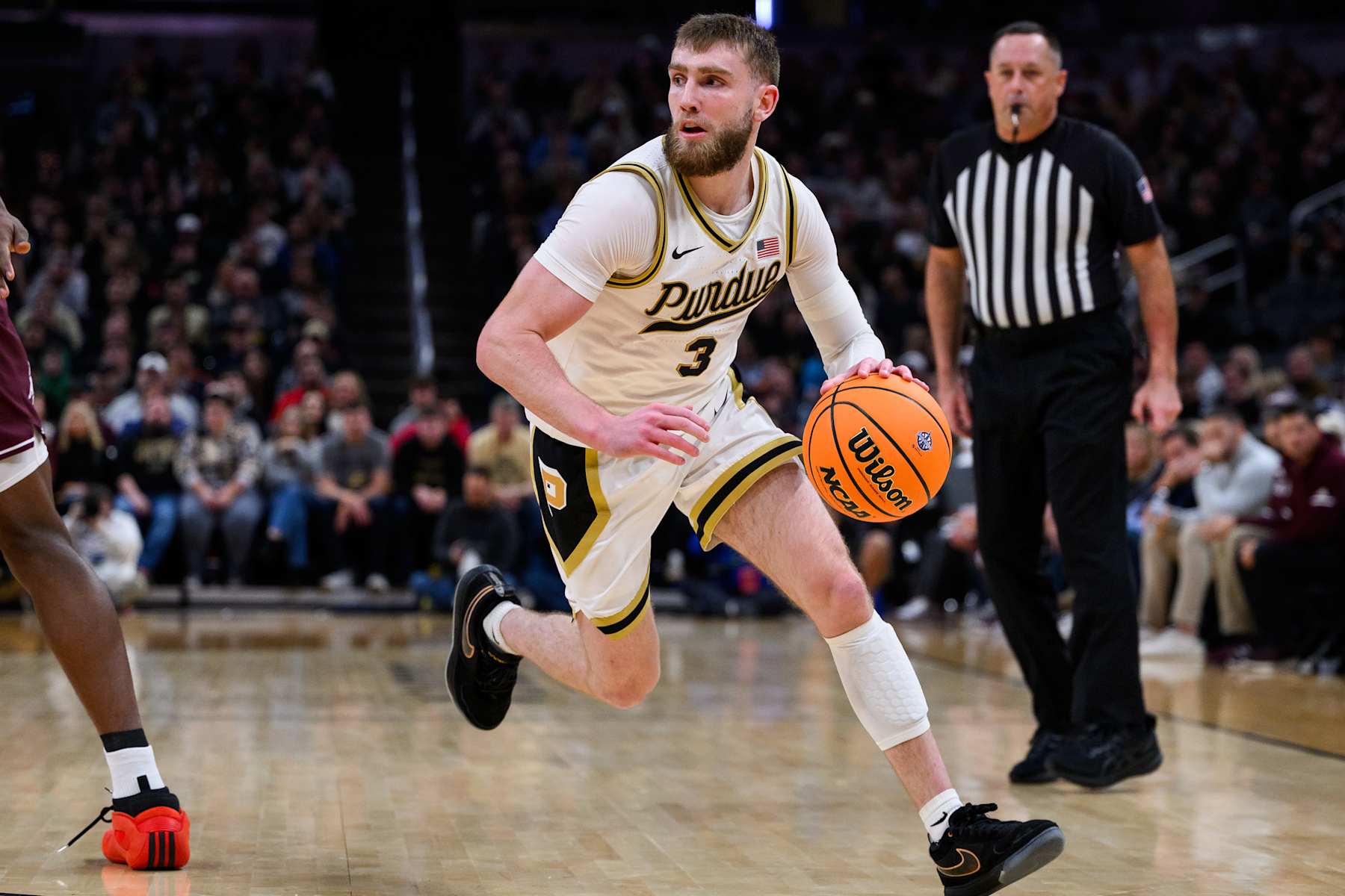 INDIANAPOLIS, IN - DECEMBER 14: Purdue Boilermakers guard Braden Smith (3) dribbles down the court during the Indy Classic men's college basketball game between the Purdue Boilermakers and Texas A&M Aggies on December 14, 2024, at Gainbridge Fieldhouse in Indianapolis, IN. (Photo by Zach Bolinger/Icon Sportswire via Getty Images)