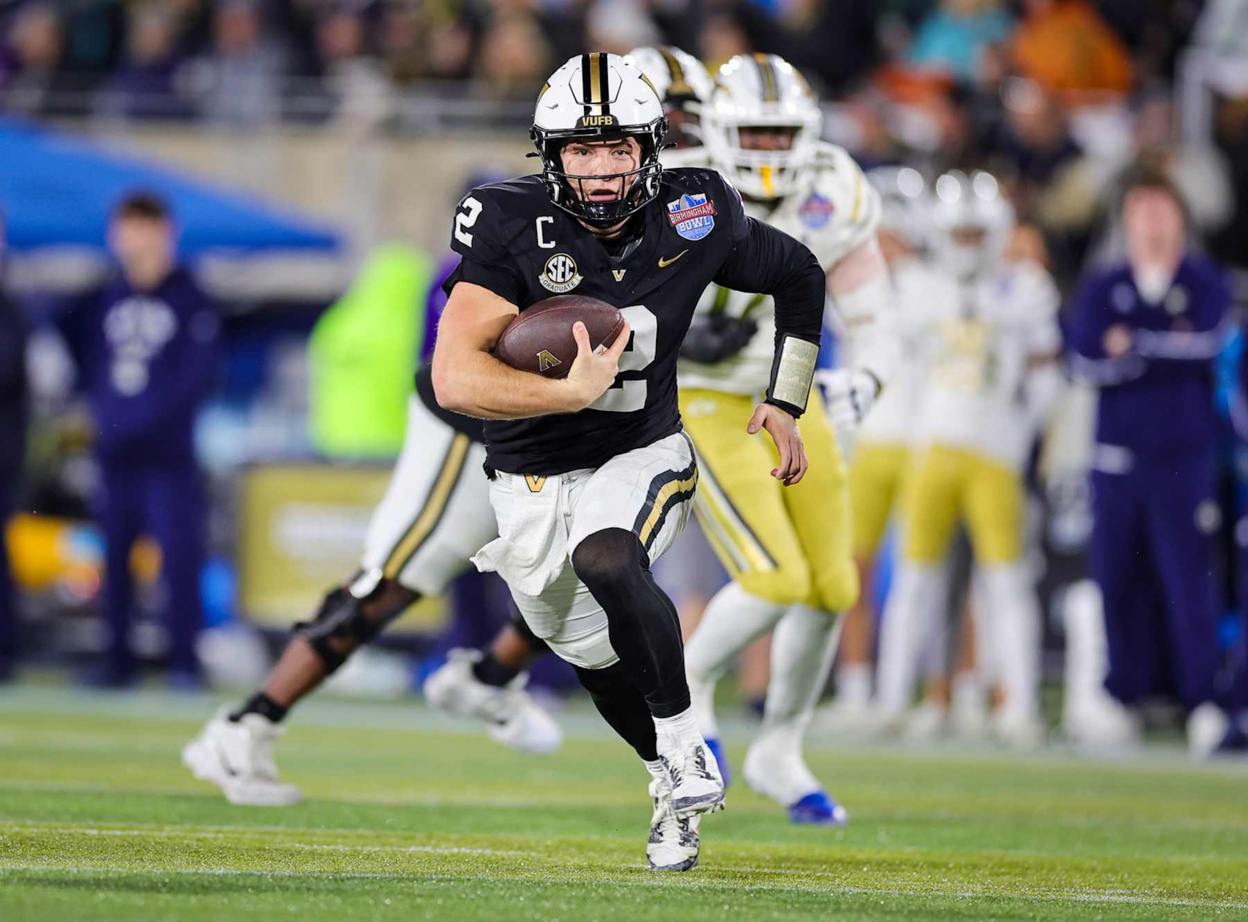 BIRMINGHAM, ALABAMA - DECEMBER 27: Diego Pavia #2 of the Vanderbilt Commodores runs the ball during the second half against the Georgia Tech Yellow Jackets in the Birmingham Bowl at Protective Stadium on December 27, 2024 in Birmingham, Alabama. (Photo by Brandon Sumrall/Getty Images) BIRMINGHAM, ALABAMA - DECEMBER 27: Diego Pavia #2 of the Vanderbilt Commodores runs the ball during the second half against the Georgia Tech Yellow Jackets in the Birmingham Bowl at Protective Stadium on December 27, 2024 in Birmingham, Alabama. (Photo by Brandon Sumrall/Getty Images)
