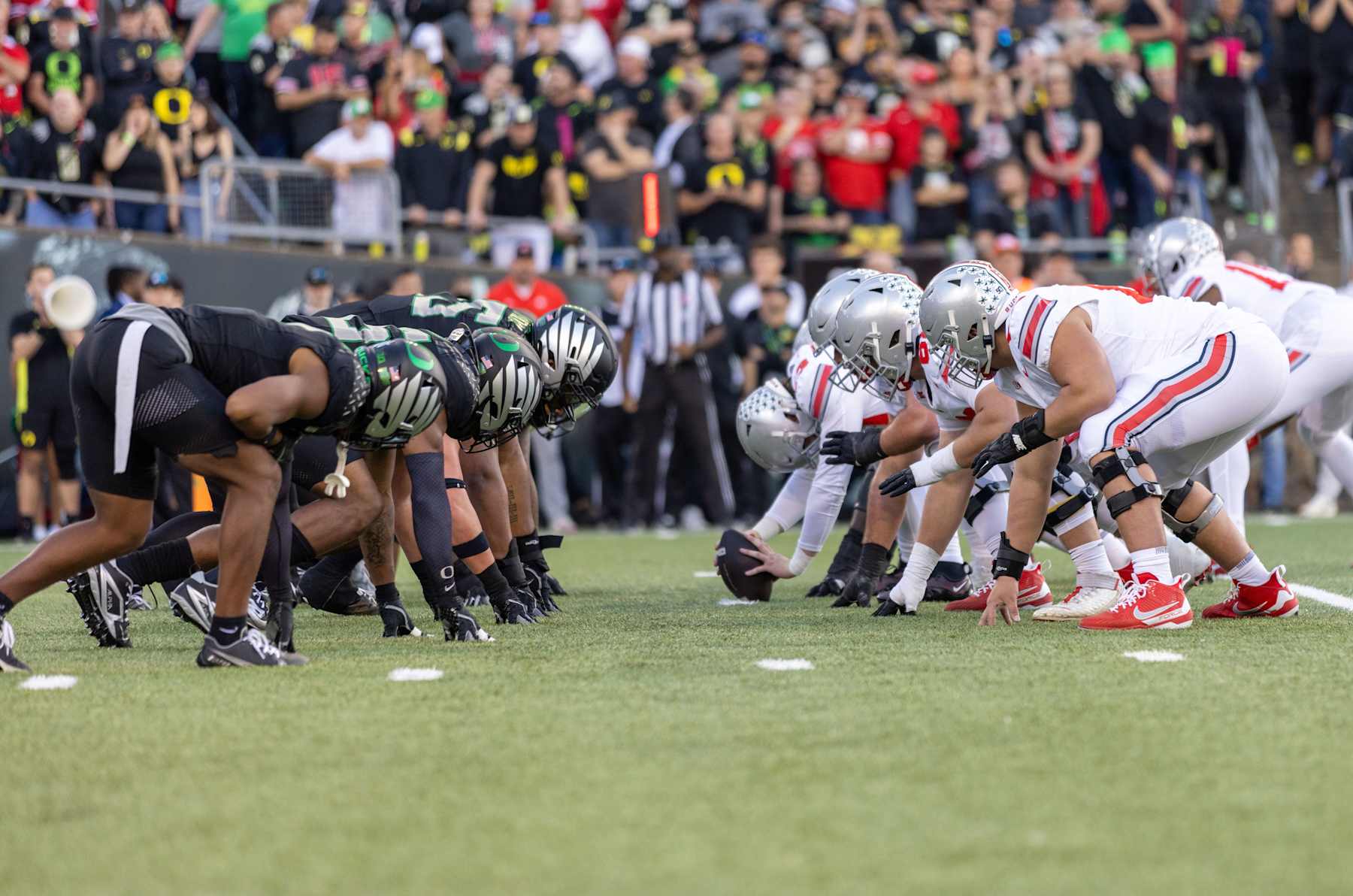 EUGENE, OREGON - OCTOBER 12:  The line of scrimmage between the Oregon Ducks and the Ohio State Buckeyes at Autzen Stadium on October 12, 2024 in Eugene, Oregon.  (Photo by Tom Hauck/Getty Images)