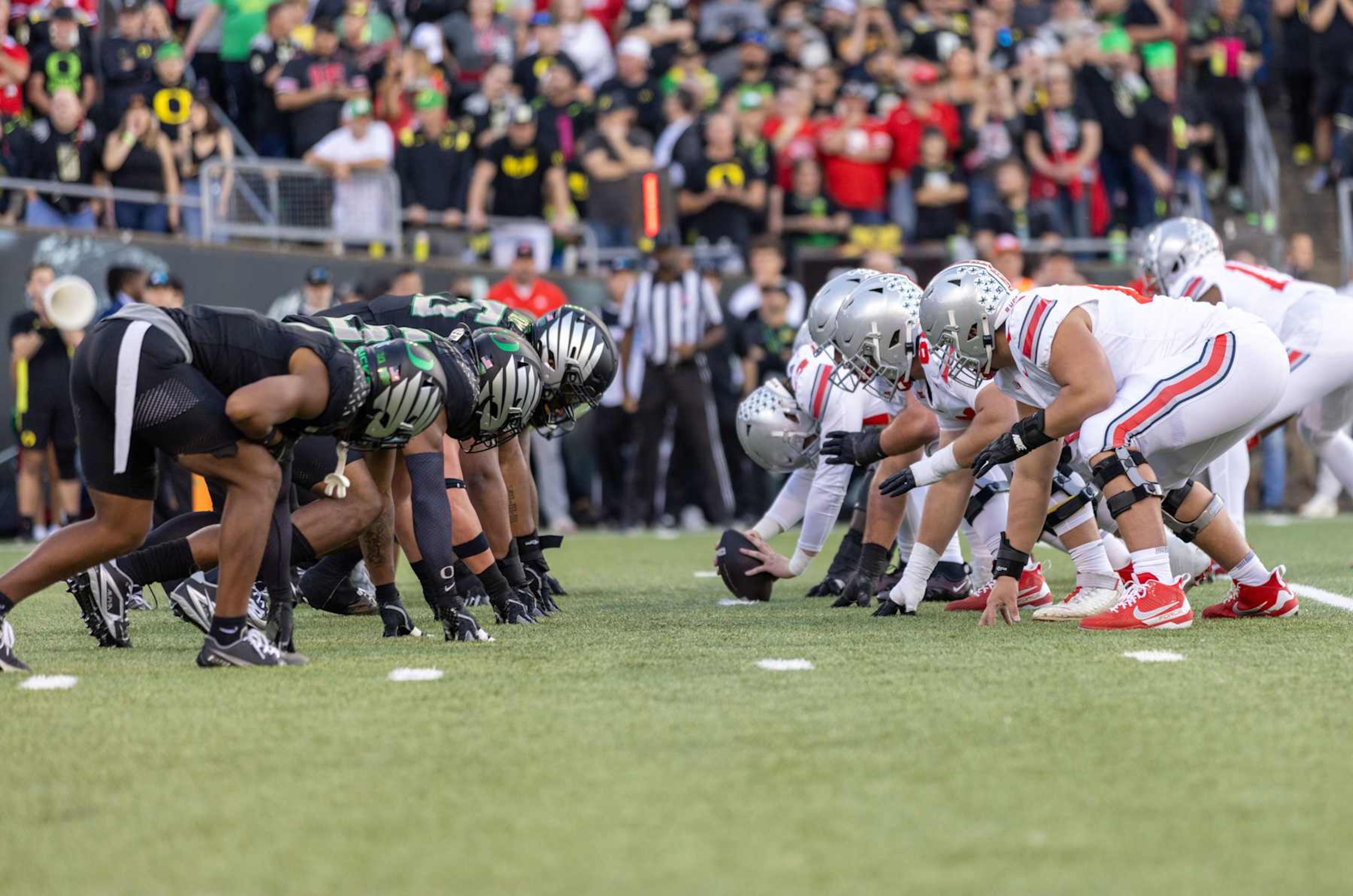 EUGENE, OREGON - OCTOBER 12: The line of scrimmage between the Oregon Ducks and the Ohio State Buckeyes at Autzen Stadium on October 12, 2024 in Eugene, Oregon. (Photo by Tom Hauck/Getty Images) EUGENE, OREGON - OCTOBER 12: The line of scrimmage between the Oregon Ducks and the Ohio State Buckeyes at Autzen Stadium on October 12, 2024 in Eugene, Oregon. (Photo by Tom Hauck/Getty Images)