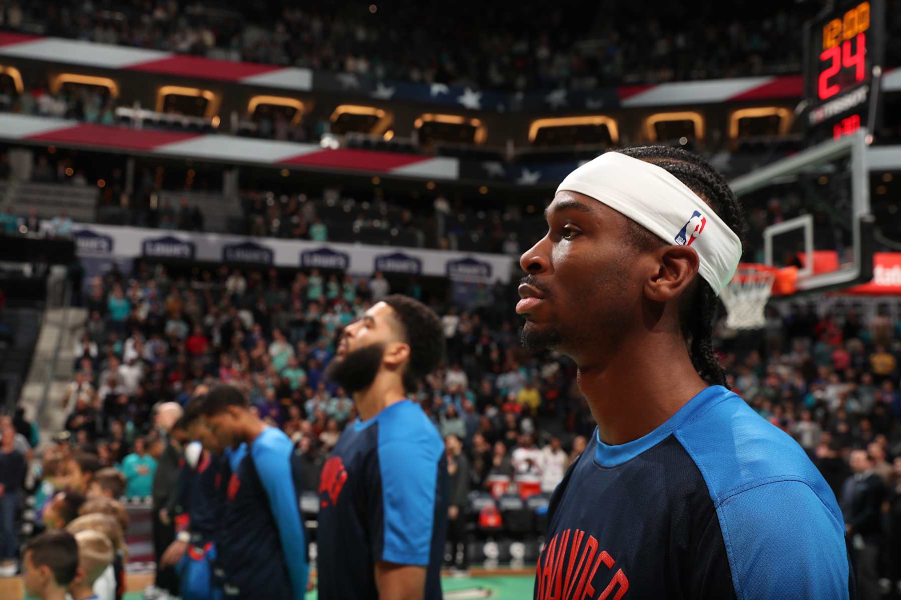 CHARLOTTE, NC - DECEMBER 28: Shai Gilgeous-Alexander #2 of the Oklahoma City Thunder looks on before the game against the Charlotte Hornets on December 28, 2024 at Spectrum Center in Charlotte, North Carolina. NOTE TO USER: User expressly acknowledges and agrees that, by downloading and or using this photograph, User is consenting to the terms and conditions of the Getty Images License Agreement. Mandatory Copyright Notice: Copyright 2024 NBAE (Photo by Kent Smith/NBAE via Getty Images)