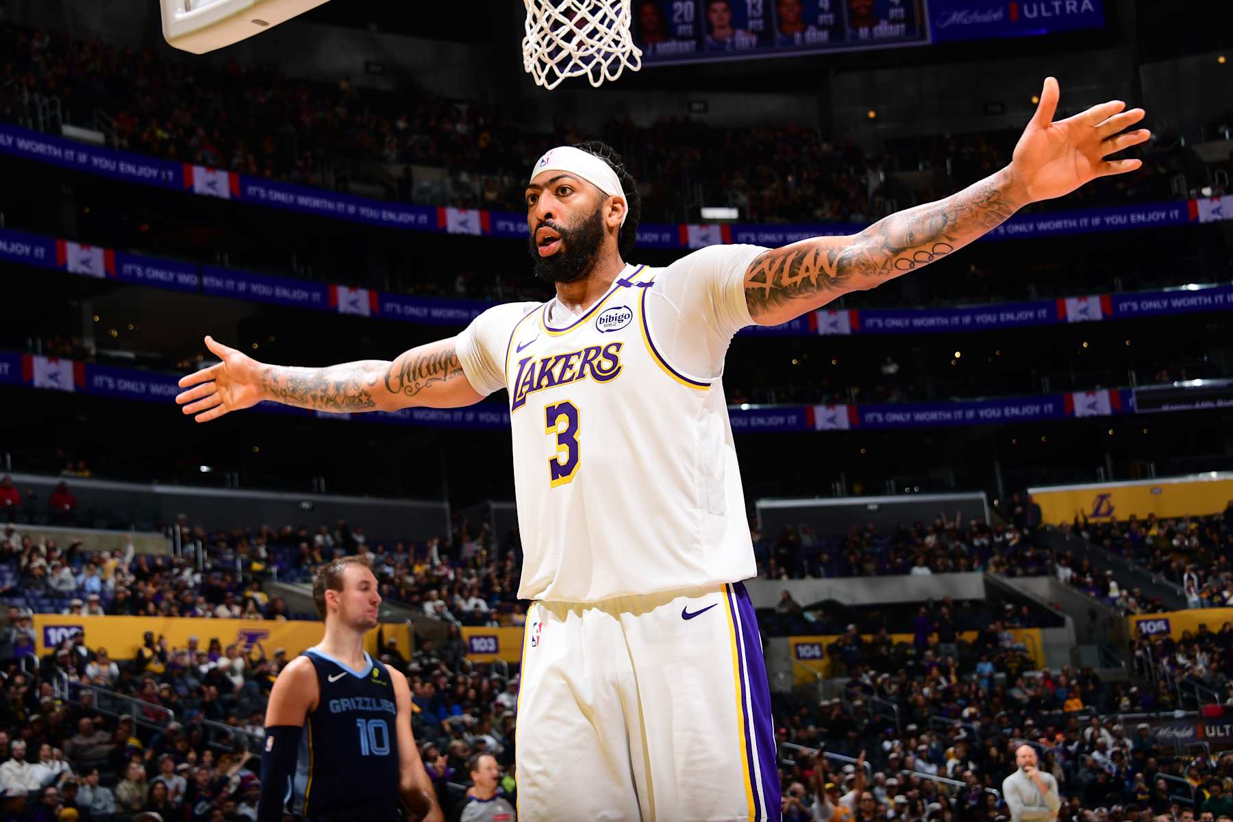 LOS ANGELES, CA - DECEMBER 15: Anthony Davis #3 of the Los Angeles Lakers looks on during the game against the Memphis Grizzlies on December 15, 2024 at Crypto.Com Arena in Los Angeles, California. NOTE TO USER: User expressly acknowledges and agrees that, by downloading and/or using this Photograph, user is consenting to the terms and conditions of the Getty Images License Agreement. Mandatory Copyright Notice: Copyright 2024 NBAE (Photo by Adam Pantozzi/NBAE via Getty Images)
