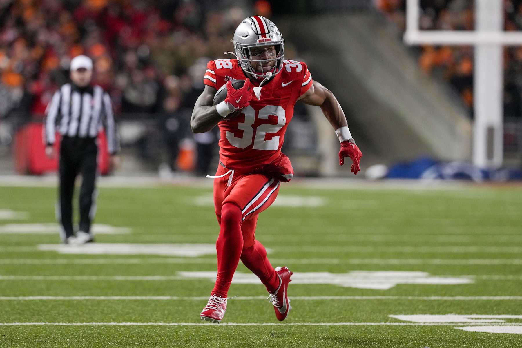 COLUMBUS, OHIO - DECEMBER 21: Running back TreVeyon Henderson #32 of the Ohio State Buckeyes seen in action during the game against the Tennessee Volunteers at Ohio Stadium on December 21, 2024 in Columbus, Ohio. (Photo by Jason Mowry/Getty Images)