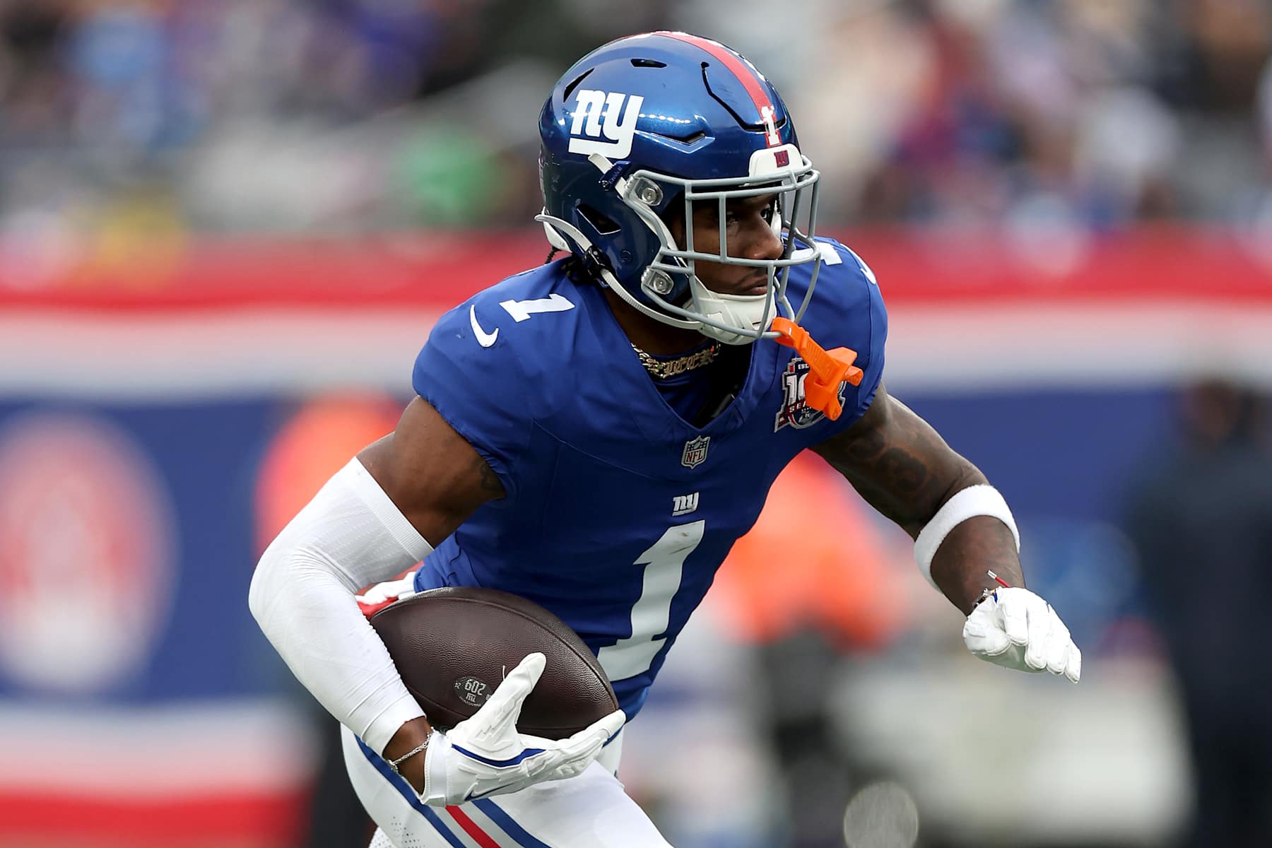 EAST RUTHERFORD, NEW JERSEY - DECEMBER 15: Malik Nabers #1 of the New York Giants in action against the Baltimore Ravens at MetLife Stadium on December 15, 2024 in East Rutherford, New Jersey. (Photo by Luke Hales/Getty Images)