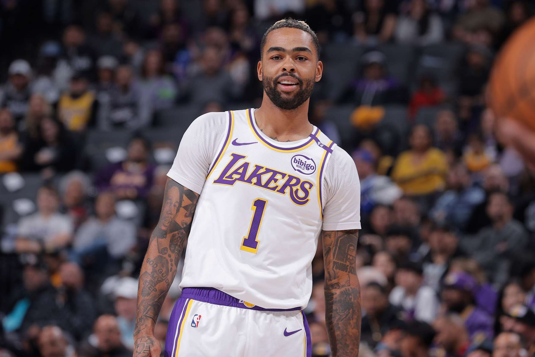 SACRAMENTO, CA - DECEMBER 21: D'Angelo Russell #1 of the Los Angeles Lakers looks on during the game against the Sacramento Kings on December 21, 2024 at Golden 1 Center in Sacramento, California. NOTE TO USER: User expressly acknowledges and agrees that, by downloading and or using this photograph, User is consenting to the terms and conditions of the Getty Images Agreement. Mandatory Copyright Notice: Copyright 2024 NBAE (Photo by Rocky Widner/NBAE via Getty Images)