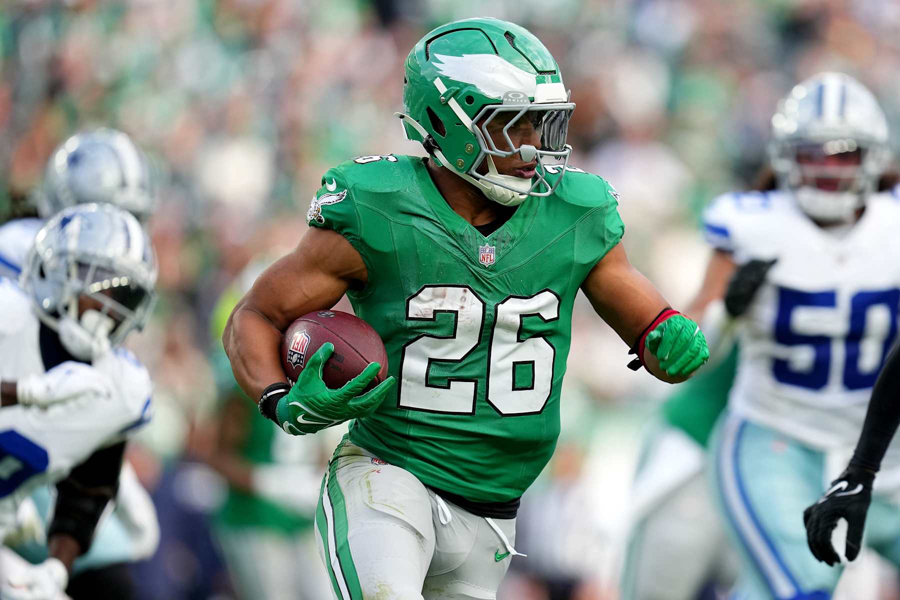 PHILADELPHIA, PENNSYLVANIA - DECEMBER 29: Saquon Barkley #26 of the Philadelphia Eagles runs the ball against the Dallas Cowboys during the third quarter at Lincoln Financial Field on December 29, 2024 in Philadelphia, Pennsylvania. (Photo by Mitchell Leff/Getty Images)