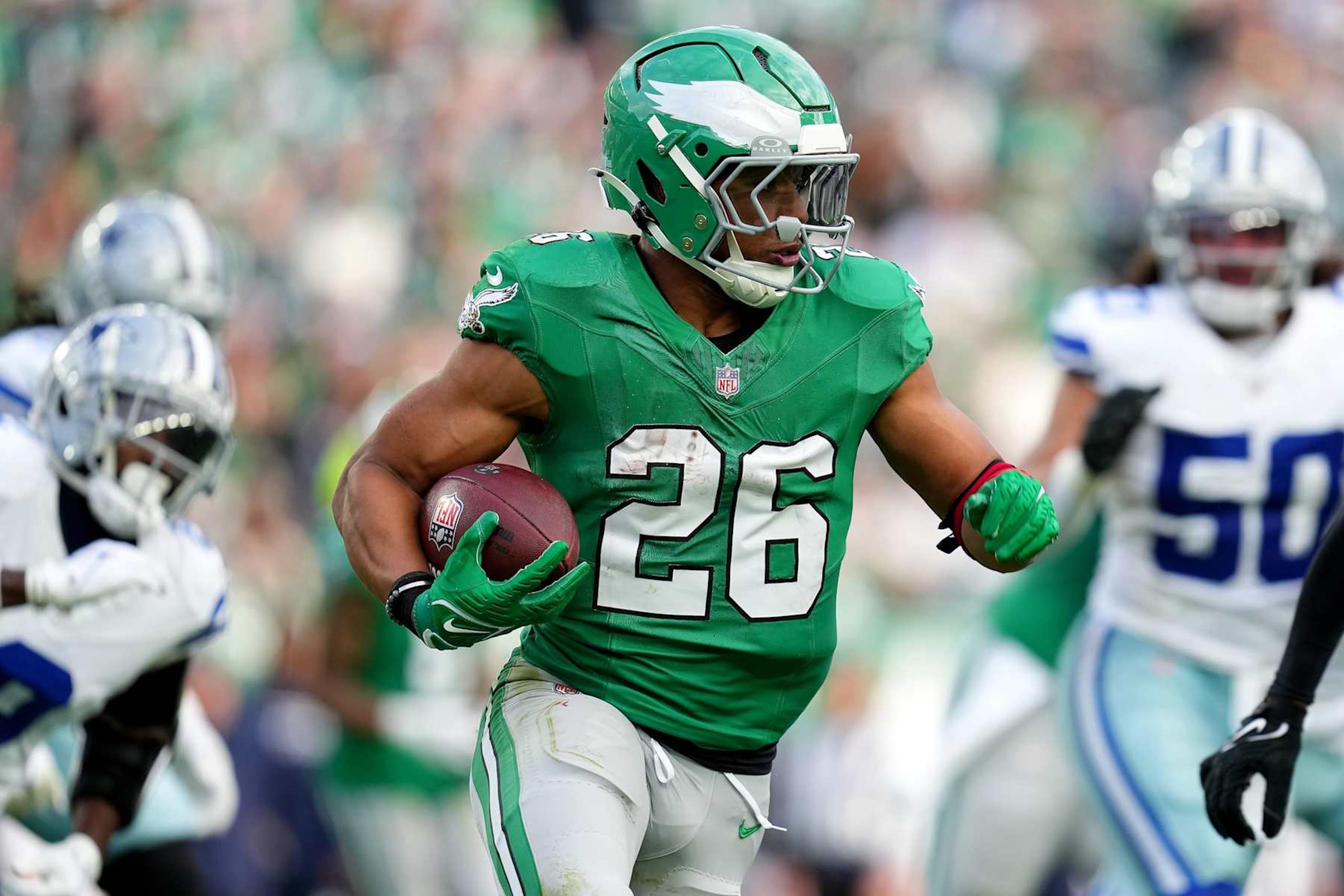 PHILADELPHIA, PENNSYLVANIA - DECEMBER 29: Saquon Barkley #26 of the Philadelphia Eagles runs the ball against the Dallas Cowboys during the third quarter at Lincoln Financial Field on December 29, 2024 in Philadelphia, Pennsylvania. (Photo by Mitchell Leff/Getty Images)