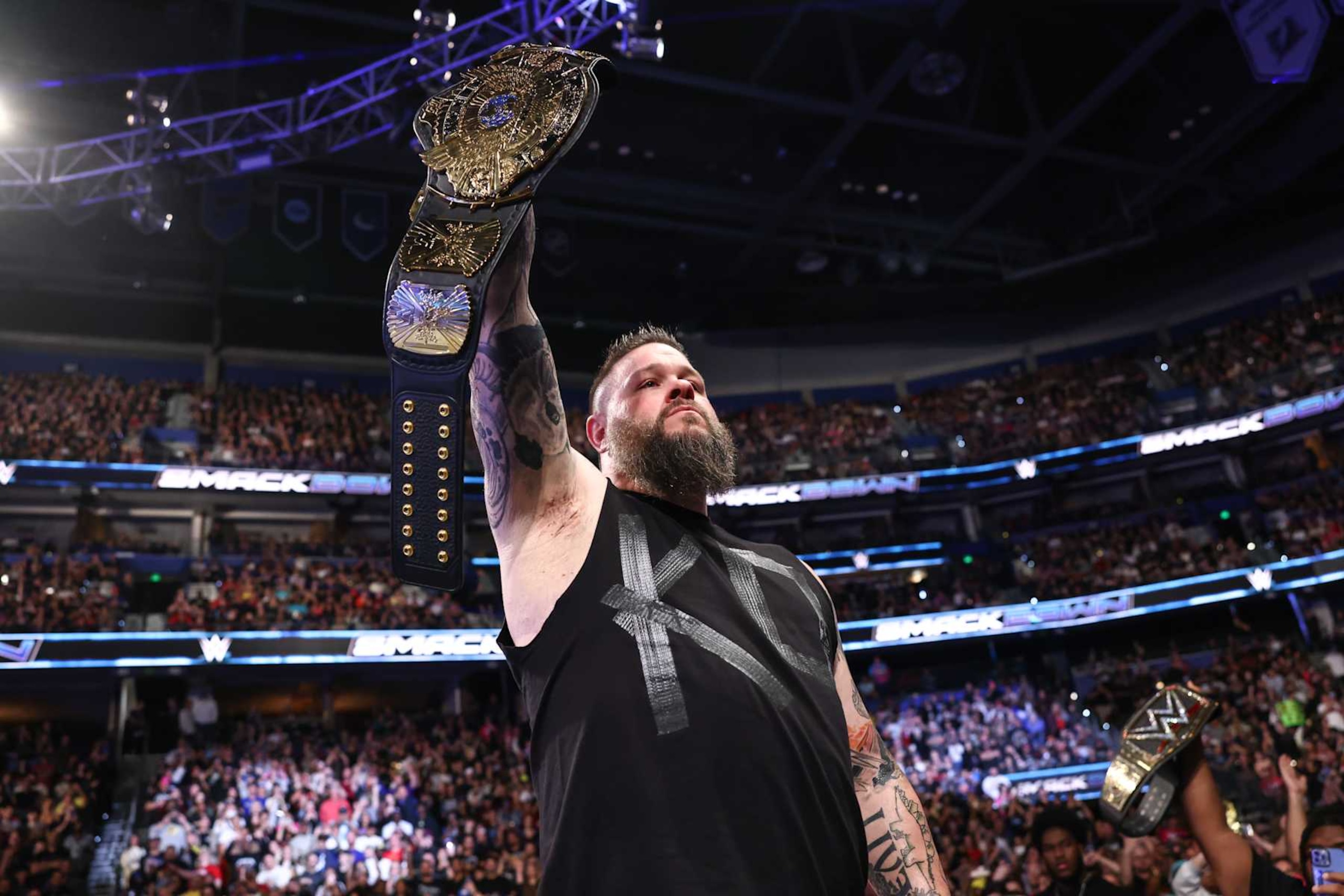 TAMPA, FLORIDA - DECEMBER 27: Kevin Owens enters the arena during SmackDown at Amalie Arena on December 27, 2024 in Tampa, Florida. (Photo by WWE/Getty Images) TAMPA, FLORIDA - DECEMBER 27: Kevin Owens enters the arena during SmackDown at Amalie Arena on December 27, 2024 in Tampa, Florida. (Photo by WWE/Getty Images)