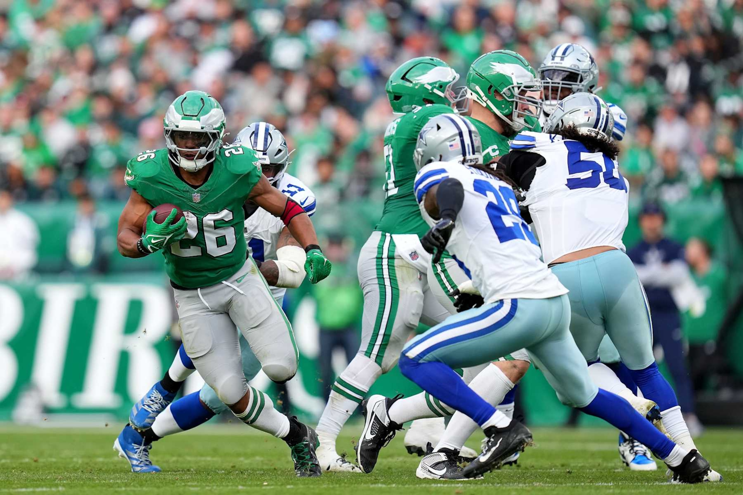 PHILADELPHIA, PENNSYLVANIA - DECEMBER 29: Saquon Barkley #26 of the Philadelphia Eagles runs the ball against the Dallas Cowboys during the third quarter at Lincoln Financial Field on December 29, 2024 in Philadelphia, Pennsylvania. (Photo by Mitchell Leff/Getty Images)