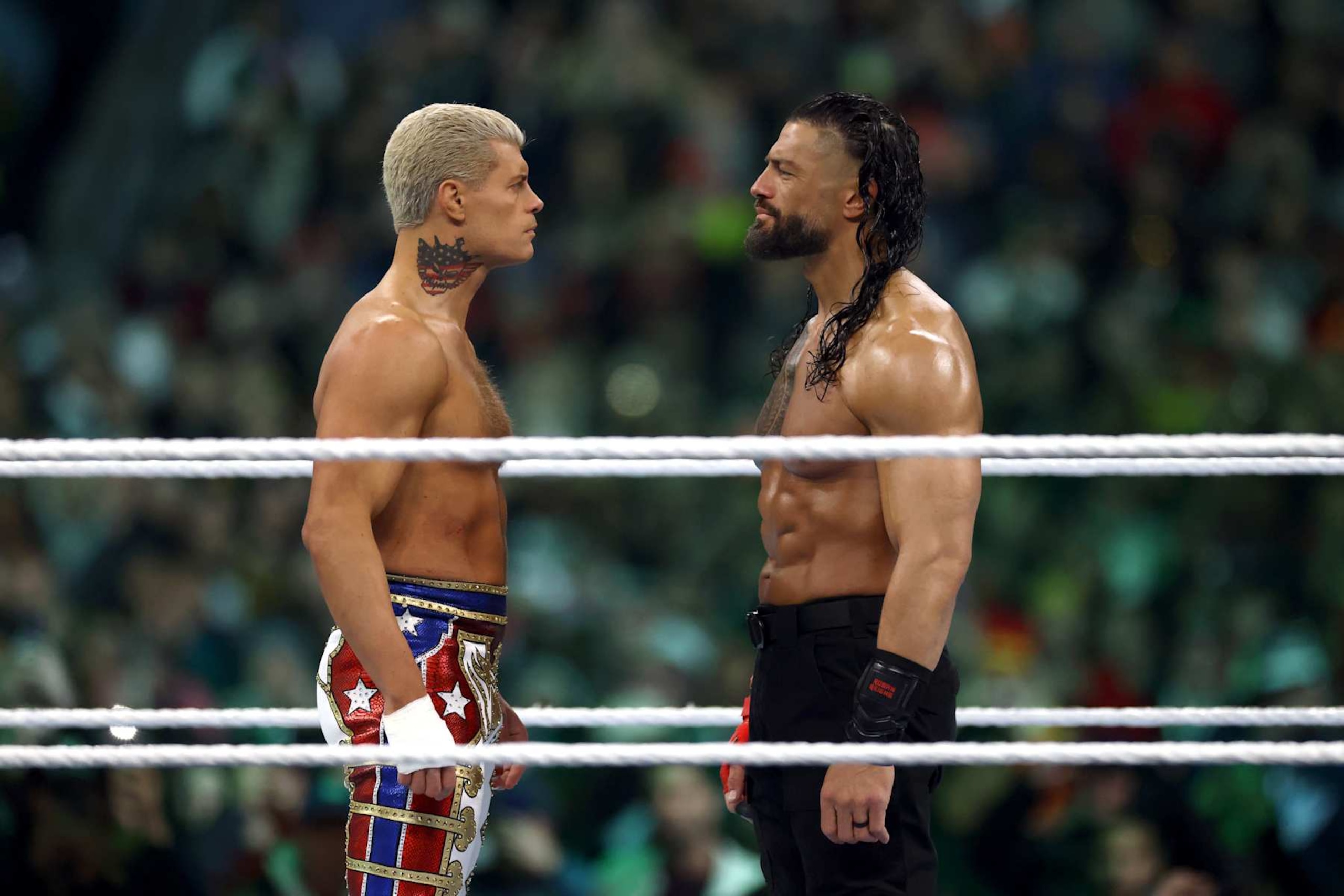 PHILADELPHIA, PENNSYLVANIA - APRIL 07: Roman Reigns and Cody Rhodes look on during Night Two at Lincoln Financial Field on April 07, 2024 in Philadelphia, Pennsylvania. (Photo by Tim Nwachukwu/Getty Images) PHILADELPHIA, PENNSYLVANIA - APRIL 07: Roman Reigns and Cody Rhodes look on during Night Two at Lincoln Financial Field on April 07, 2024 in Philadelphia, Pennsylvania. (Photo by Tim Nwachukwu/Getty Images)