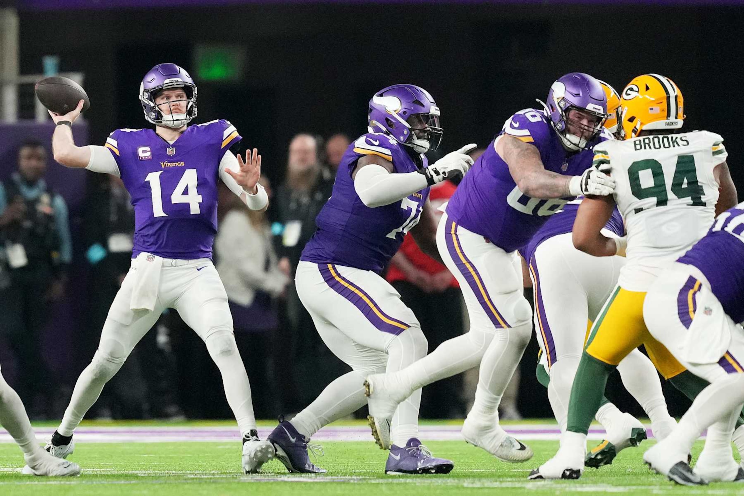 MINNEAPOLIS, MINNESOTA - DECEMBER 29: Sam Darnold #14 of the Minnesota Vikings throws a pass during the third quarter of a game against the Green Bay Packers at U.S. Bank Stadium on December 29, 2024 in Minneapolis, Minnesota. (Photo by Brace Hemmelgarn/Getty Images)