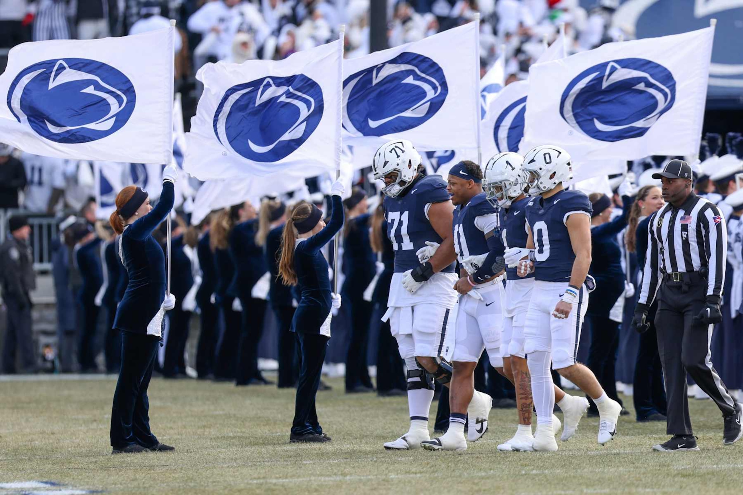 STATE COLLEGE, PA - DECEMBER 21: Penn State Nittany Lions captains before a game between SMU and Penn State at Beaver Stadium on December 21, 2024 in State College, Pennsylvania. (Photo by Roger Wimmer/ISI Photos/Getty Images)