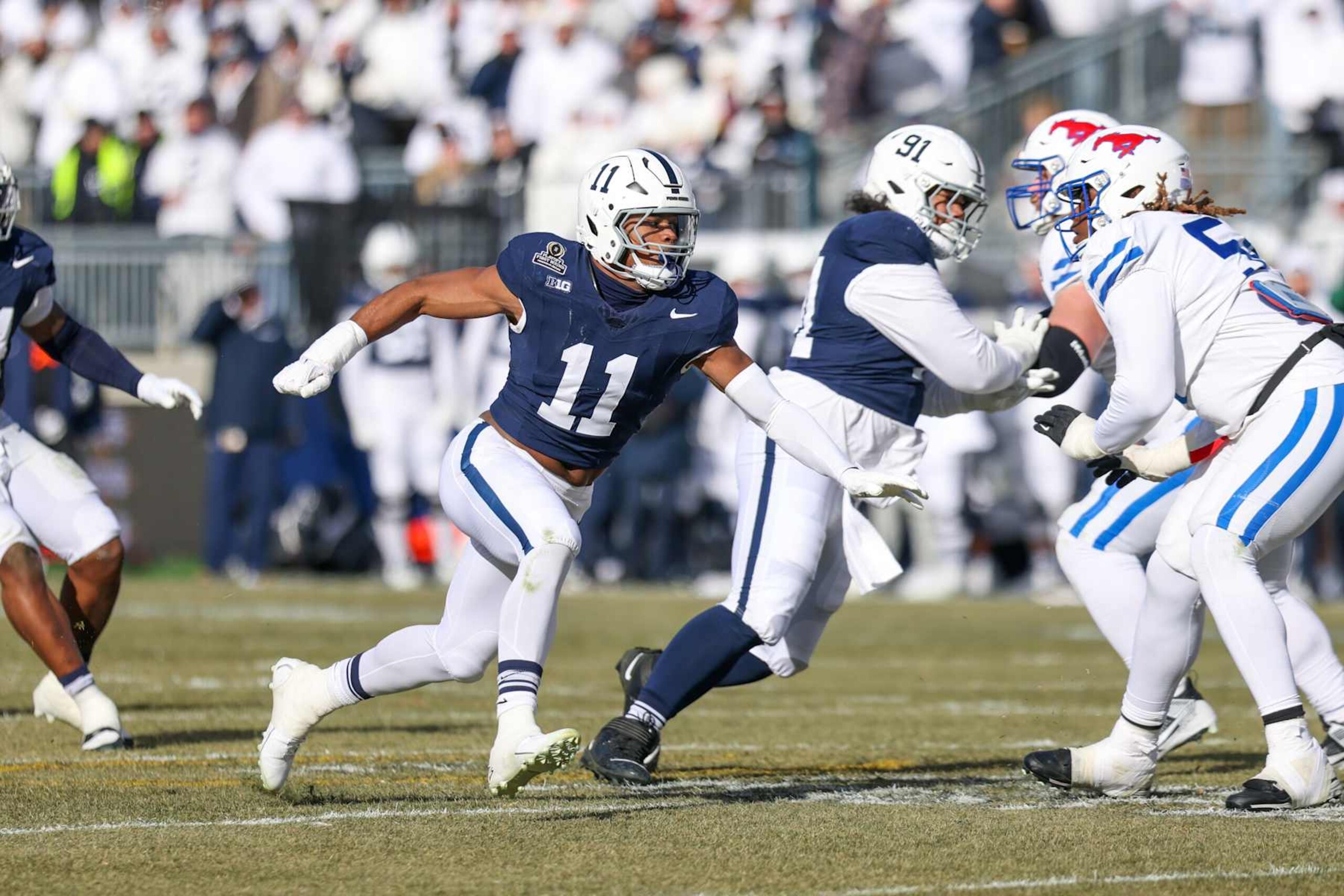 STATE COLLEGE, PA - DECEMBER 21: Abdul Carter #11 of the Penn State Nittany Lions rushes during a game between SMU and Penn State at Beaver Stadium on December 21, 2024 in State College, Pennsylvania. (Photo by Roger Wimmer/ISI Photos/Getty Images)