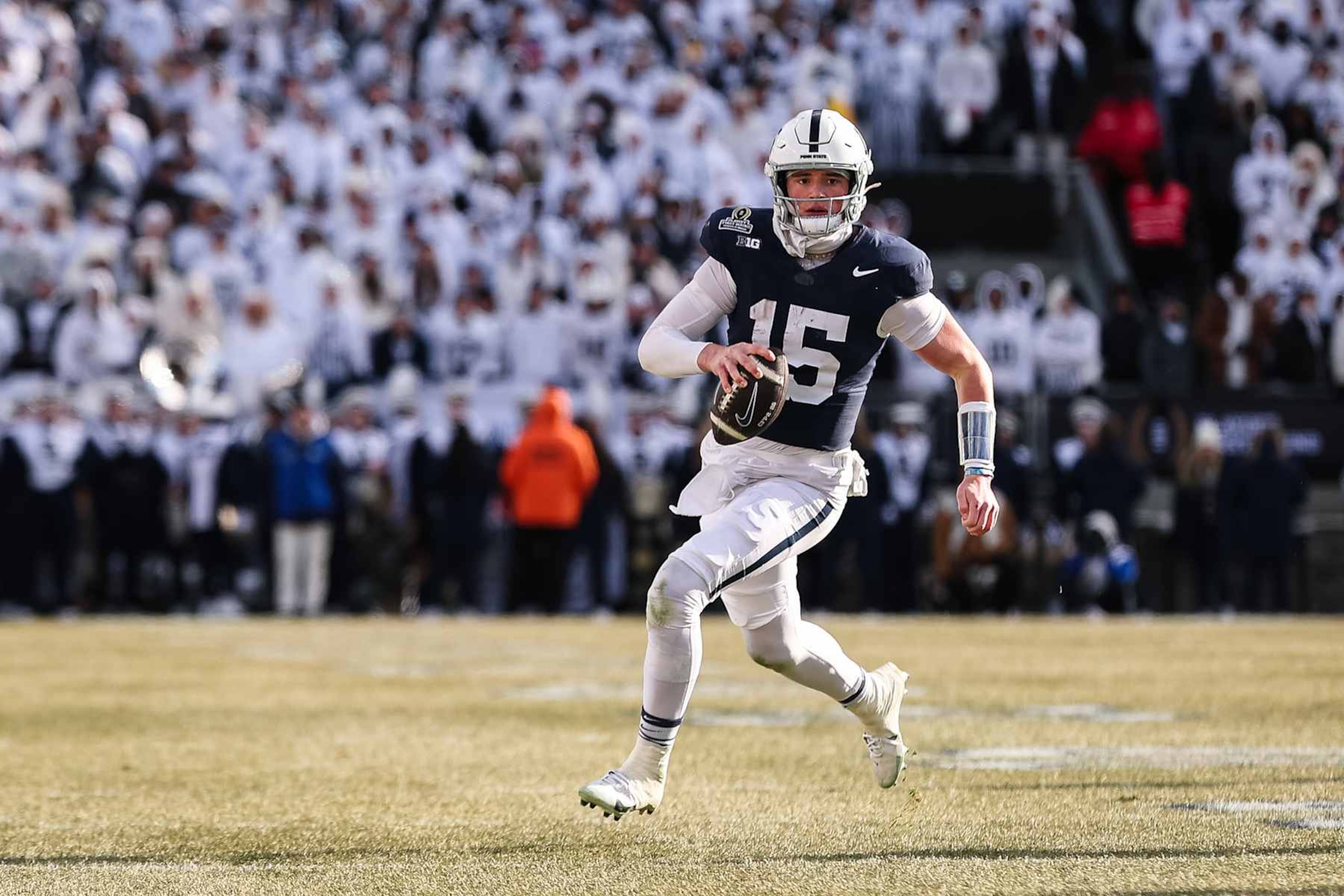 STATE COLLEGE, PA - DECEMBER 21: Drew Allar #15 of the Penn State Nittany Lions carries the ball against the Southern Methodist Mustangs during the first half at Beaver Stadium on December 21, 2024 in State College, Pennsylvania. (Photo by Scott Taetsch/Getty Images)