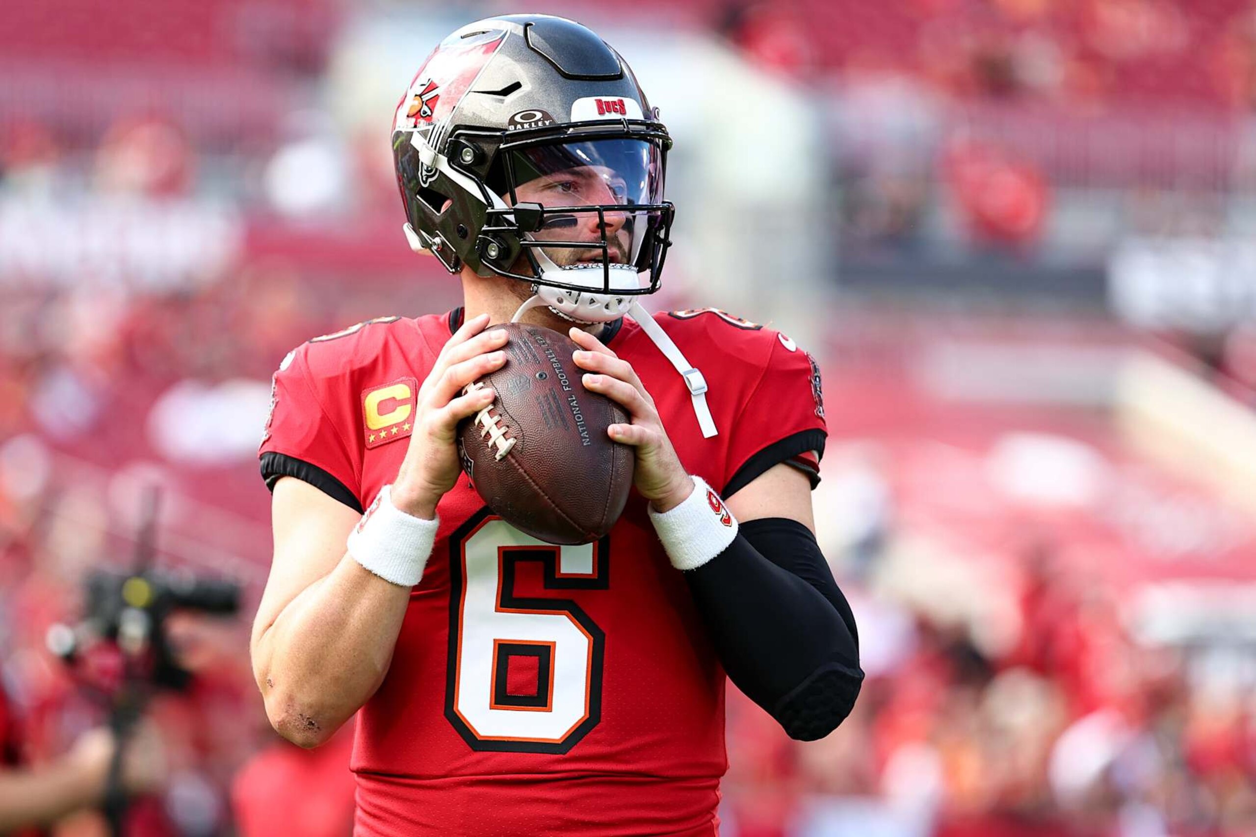 TAMPA, FLORIDA - DECEMBER 29: Baker Mayfield #6 of the Tampa Bay Buccaneers warms up prior to an NFL football game against the Carolina Panthers at Raymond James Stadium on December 29, 2024 in Tampa, Florida. (Photo by Kevin Sabitus/Getty Images) TAMPA, FLORIDA - DECEMBER 29: Baker Mayfield #6 of the Tampa Bay Buccaneers warms up prior to an NFL football game against the Carolina Panthers at Raymond James Stadium on December 29, 2024 in Tampa, Florida. (Photo by Kevin Sabitus/Getty Images)