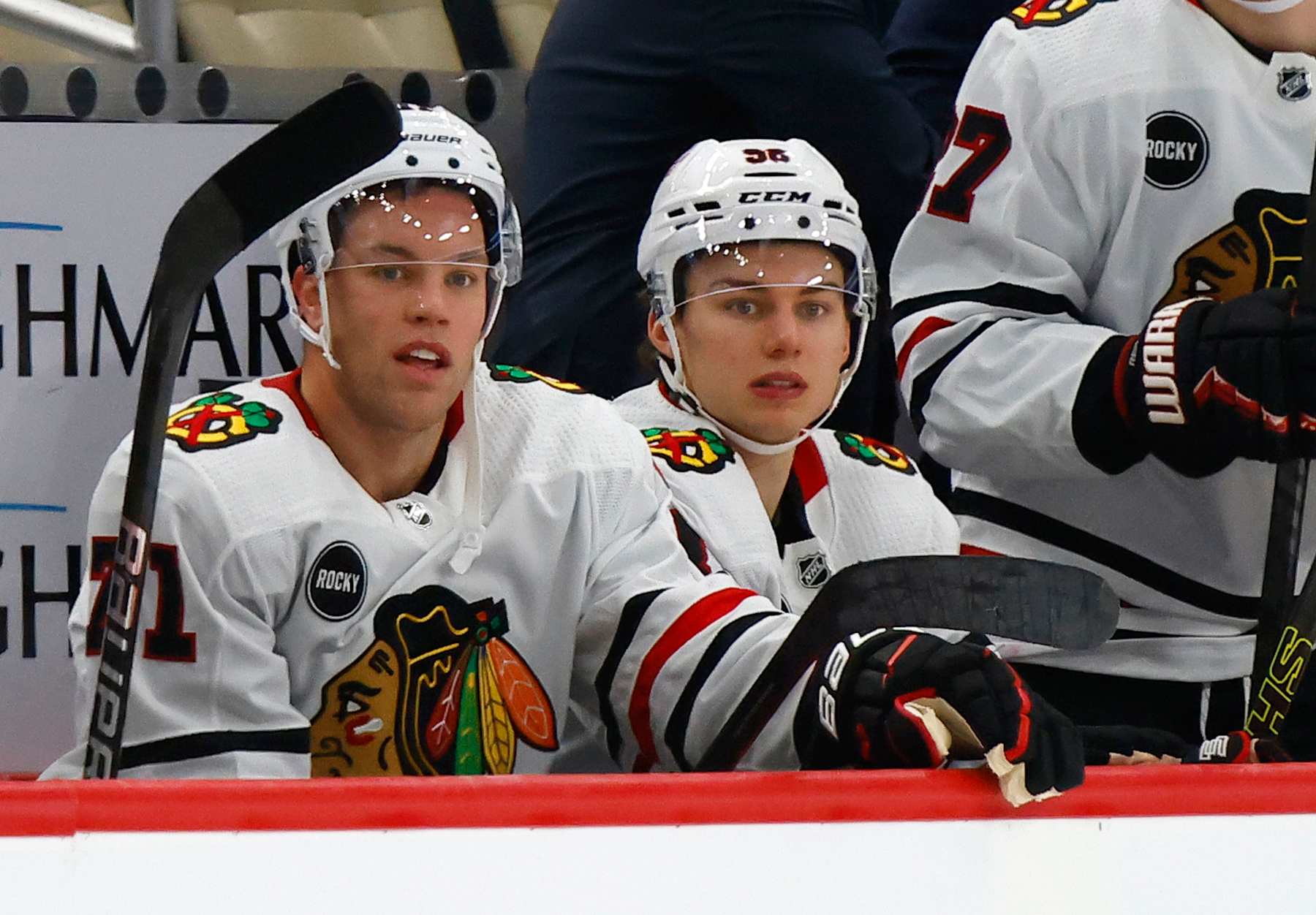 PITTSBURGH, PENNSYLVANIA - OCTOBER 10: Connor Bedard #98 and Taylor Hall #71 of the Chicago Blackhawks are seen on the bench during the third period against the Pittsburgh Penguins at PPG PAINTS Arena on October 10, 2023 in Pittsburgh, Pennsylvania. (Photo by Bruce Bennett/Getty Images)