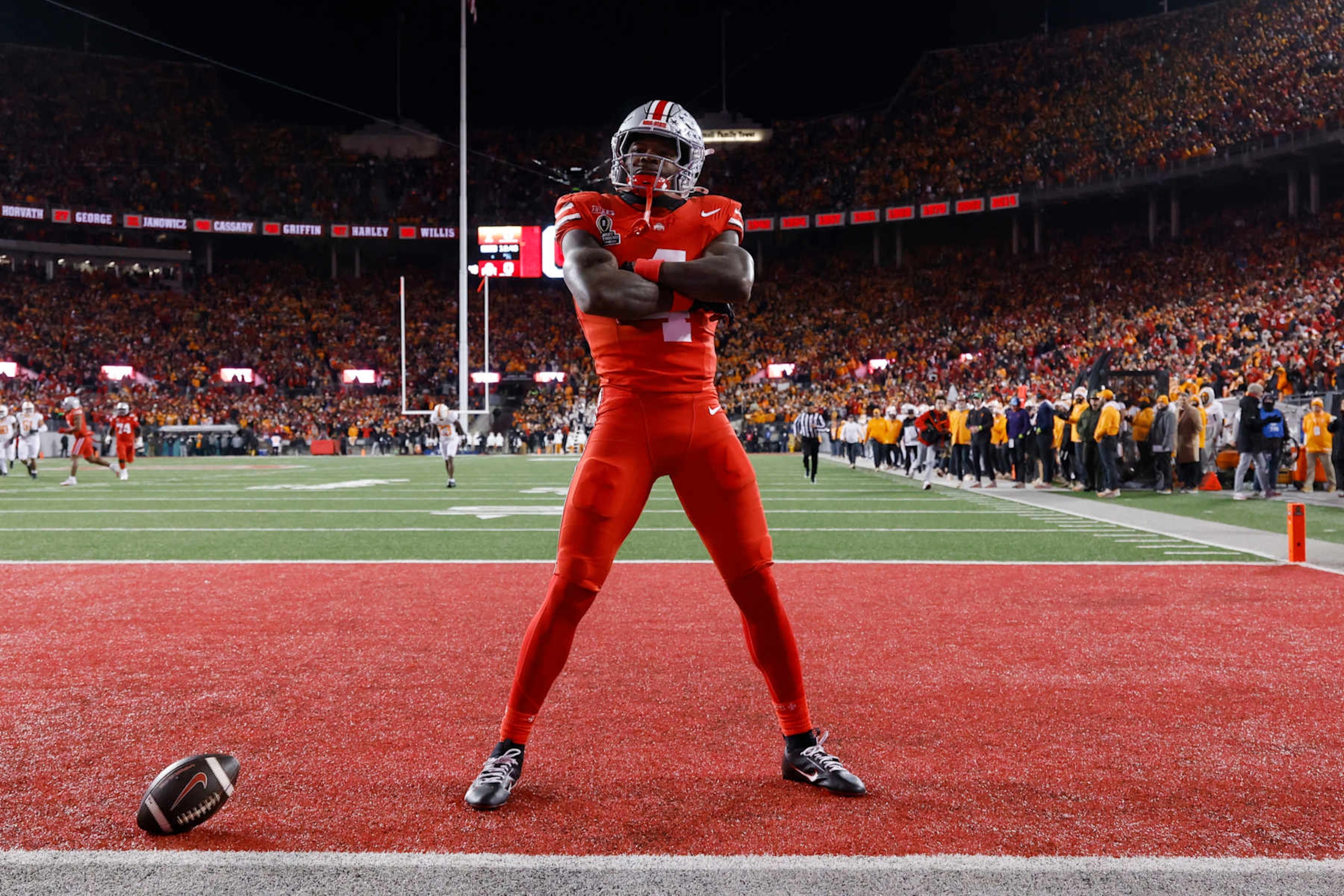 COLUMBUS, OH - DECEMBER 21: Ohio State Buckeyes wide receiver Jeremiah Smith (4) reacts after a 37-yard touchdown reception in the first quarter against the Tennessee Volunteers during the CFP First Round game on December 21, 2024 at Ohio Stadium in Columbus, Ohio. (Photo by Joe Robbins/Icon Sportswire via Getty Images)