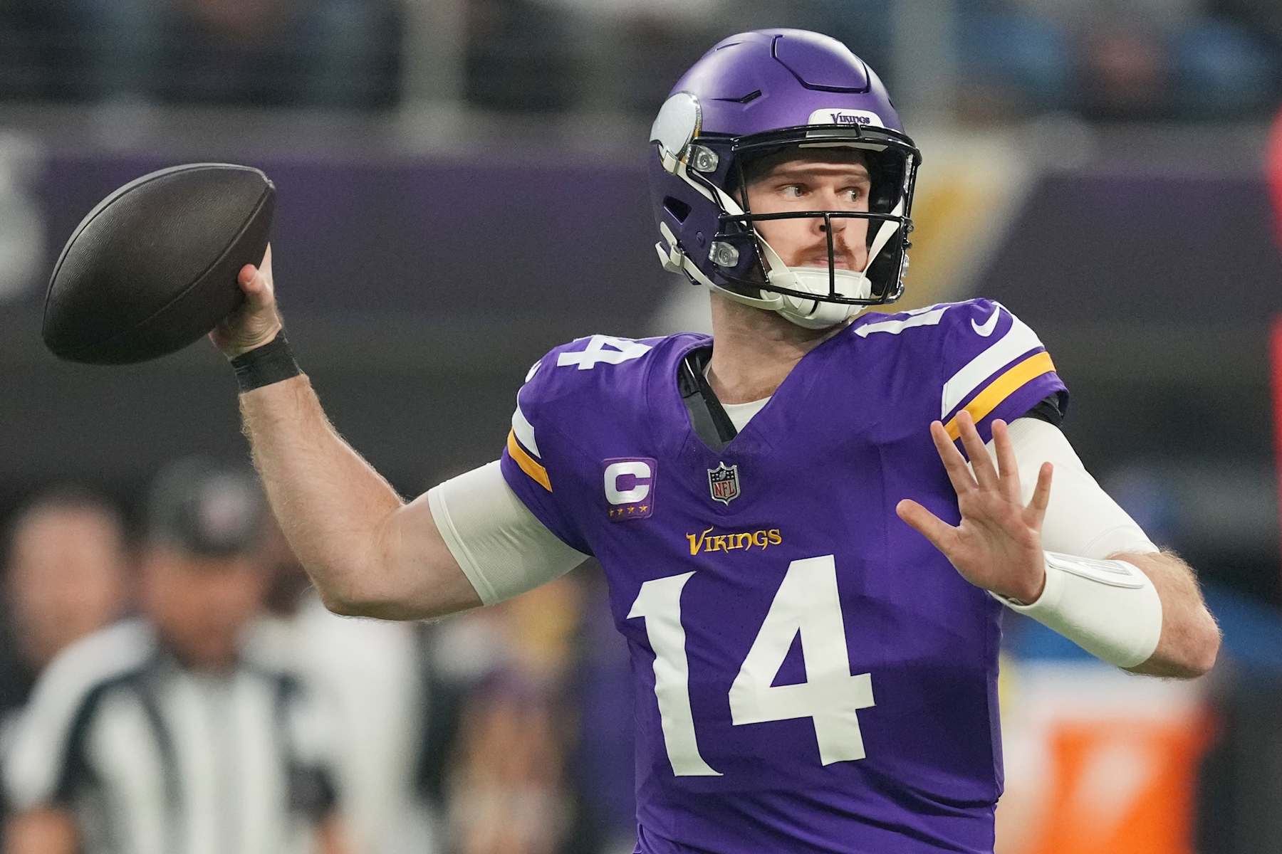 MINNEAPOLIS, MINNESOTA - DECEMBER 29: Sam Darnold #14 of the Minnesota Vikings throws a pass during the first quarter against the Green Bay Packers at U.S. Bank Stadium on December 29, 2024 in Minneapolis, Minnesota. (Photo by Brace Hemmelgarn/Getty Images)