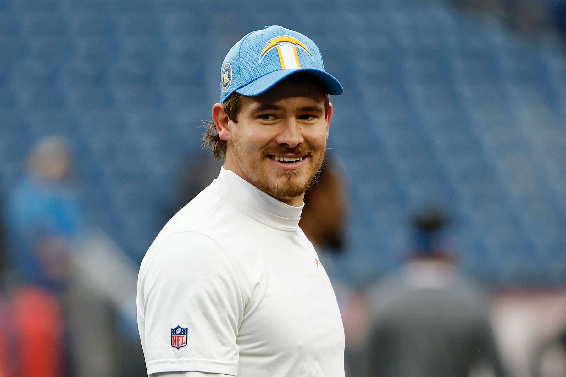 FOXBOROUGH, MA - DECEMBER 28: Justin Herbert #10 of the Los Angeles Chargers smiles before their game against the New England Patriots at Gillette Stadium on December 28, 2024 in Foxborough, Massachusetts.(Photo By Winslow Townson/Getty Images)