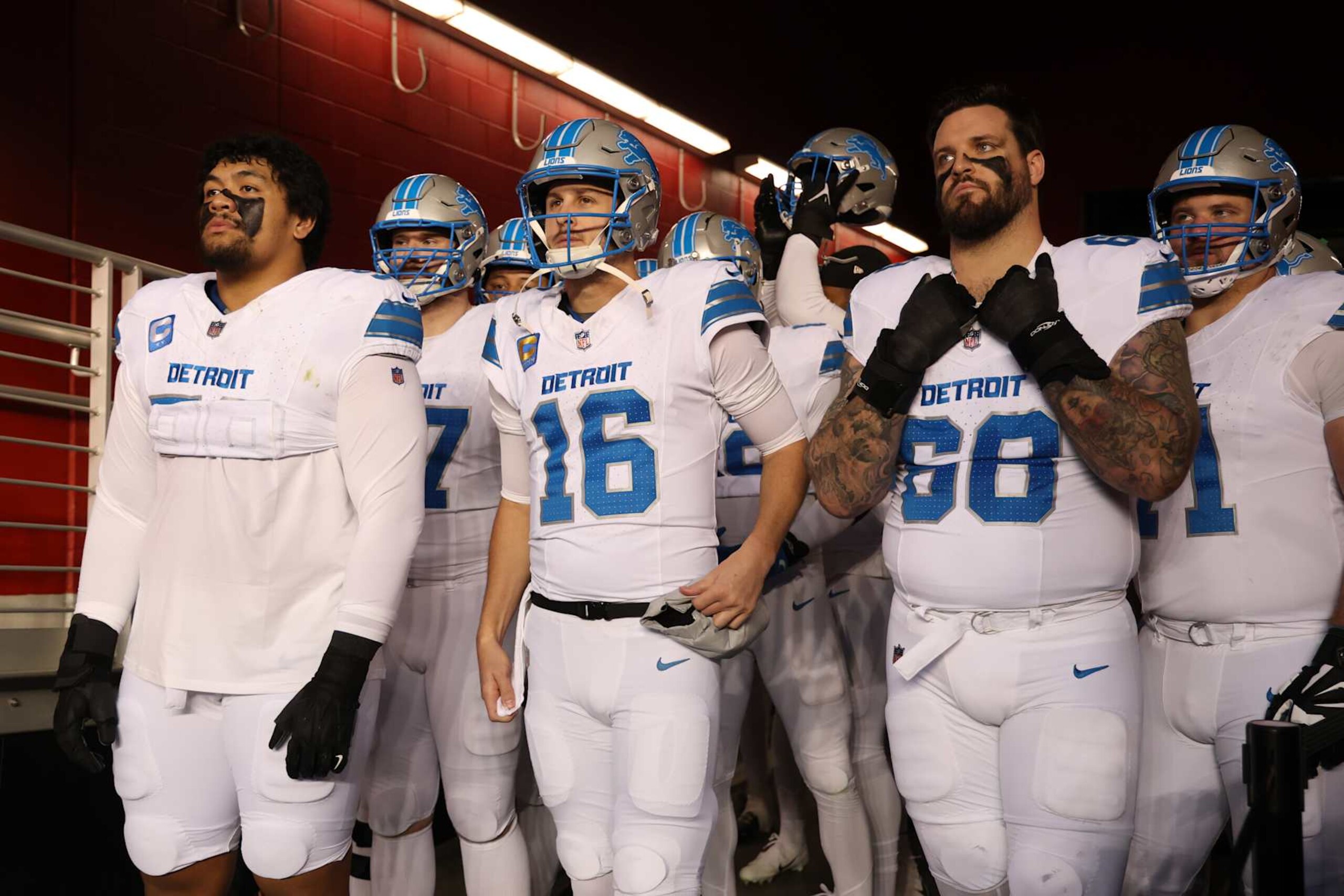 SANTA CLARA, CALIFORNIA - DECEMBER 30: Penei Sewell #58, Jared Goff #16, and Taylor Decker #68 of the Detroit Lions wait in the tunnel before the game against the San Francisco 49ers at Levi's Stadium on December 30, 2024 in Santa Clara, California. (Photo by Ezra Shaw/Getty Images) SANTA CLARA, CALIFORNIA - DECEMBER 30: Penei Sewell #58, Jared Goff #16, and Taylor Decker #68 of the Detroit Lions wait in the tunnel before the game against the San Francisco 49ers at Levi's Stadium on December 30, 2024 in Santa Clara, California. (Photo by Ezra Shaw/Getty Images)