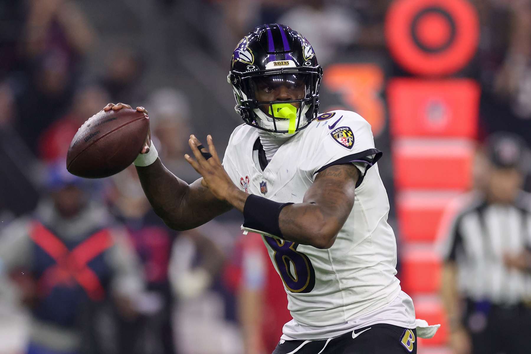 HOUSTON, TEXAS - DECEMBER 25: Lamar Jackson #8 of the Baltimore Ravens throws a pass in the second half against the Houston Texans at NRG Stadium on December 25, 2024 in Houston, Texas. (Photo by Tim Warner/Getty Images)