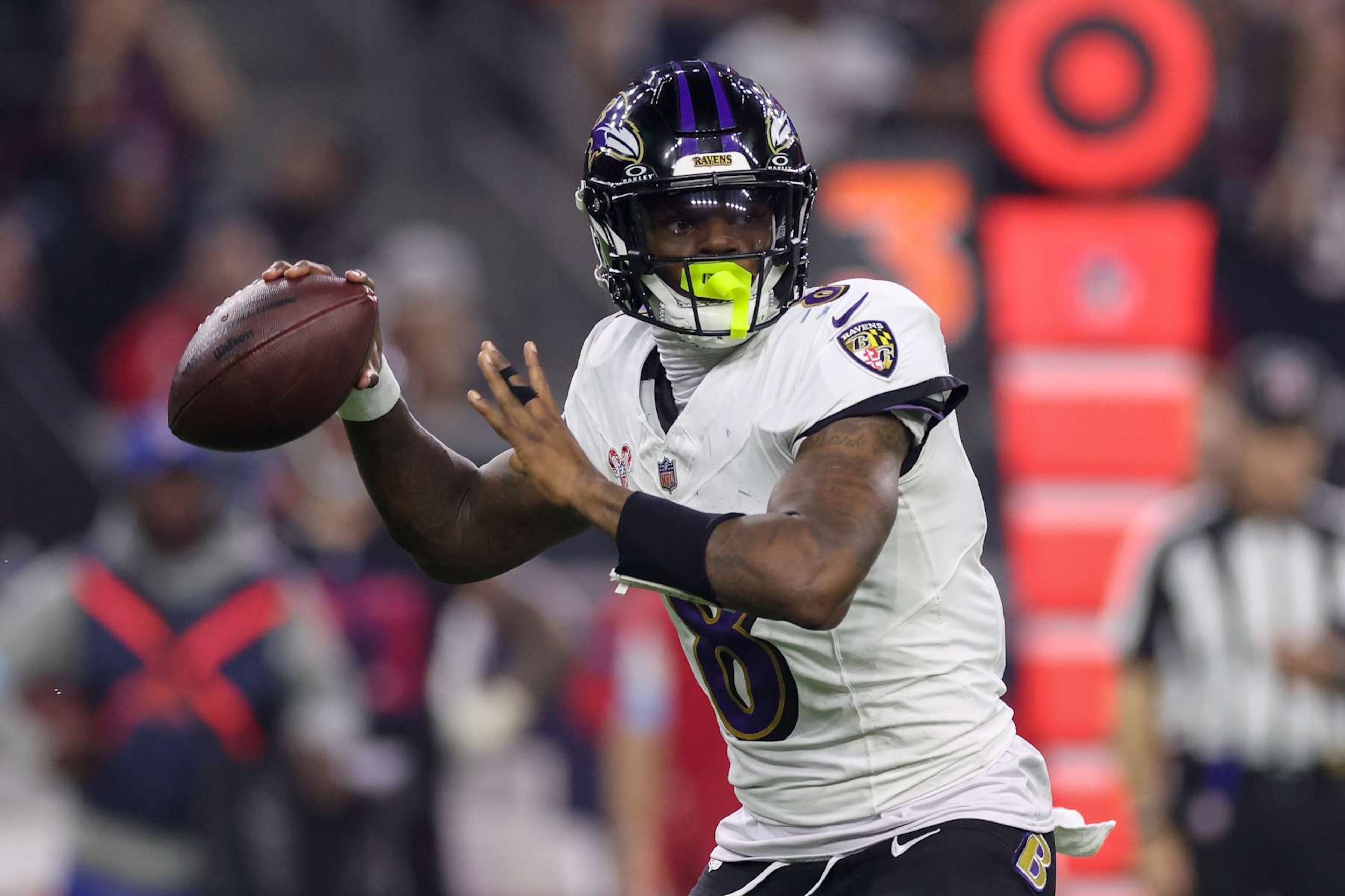 HOUSTON, TEXAS - DECEMBER 25: Lamar Jackson #8 of the Baltimore Ravens throws a pass in the second half against the Houston Texans at NRG Stadium on December 25, 2024 in Houston, Texas. (Photo by Tim Warner/Getty Images) HOUSTON, TEXAS - DECEMBER 25: Lamar Jackson #8 of the Baltimore Ravens throws a pass in the second half against the Houston Texans at NRG Stadium on December 25, 2024 in Houston, Texas. (Photo by Tim Warner/Getty Images)