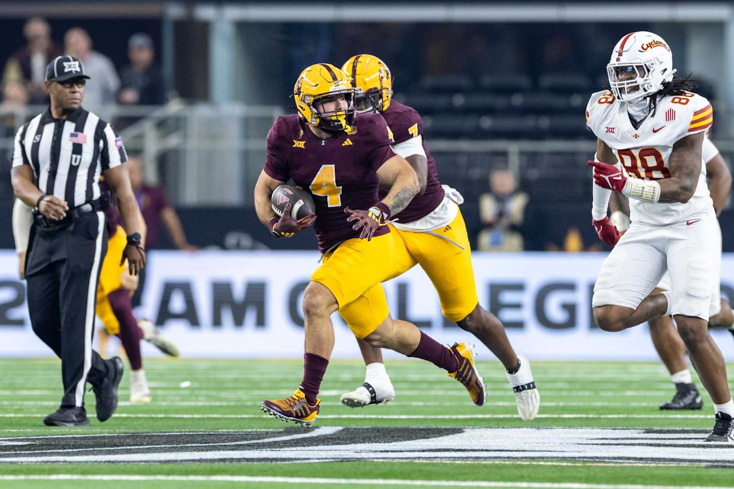 ARLINGTON, TX - DECEMBER 07: Arizona State Sun Devils running back Cam Skattebo (#4) runs up field during the Big 12 championship football game between the Arizona State Sun Devils and the Iowa State Cyclones on December 7, 2024 at AT&T Stadium in Arlington, TX.  (Photo by Matthew Visinsky/Icon Sportswire via Getty Images)