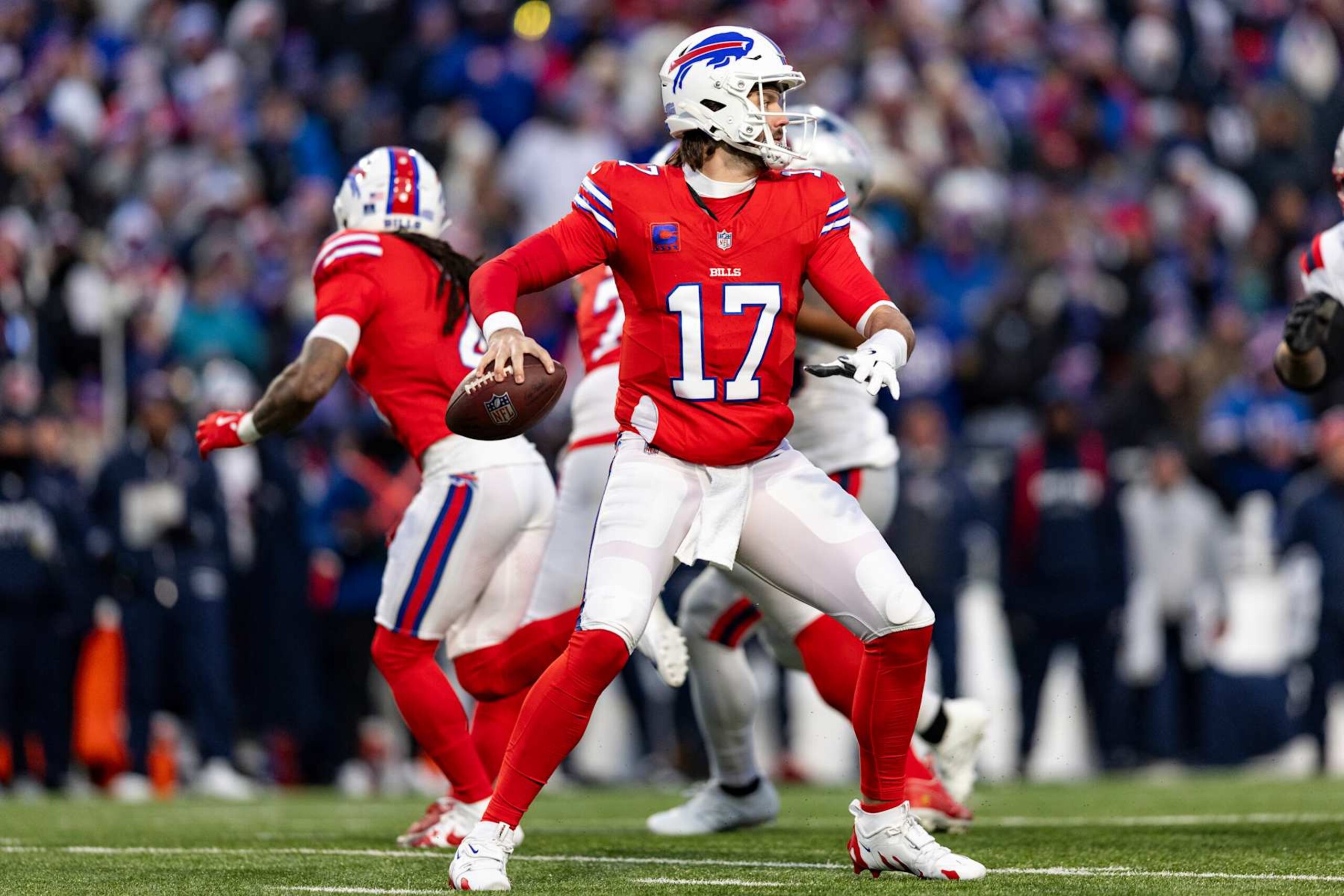 ORCHARD PARK, NEW YORK - DECEMBER 22: Josh Allen #17 of the Buffalo Bills throws a pass in the first quarter of the game against the New England Patriots at Highmark Stadium on December 22, 2024 in Orchard Park, New York. The Bills beat the Patriots 24-21. (Photo by Lauren Leigh Bacho/Getty Images)