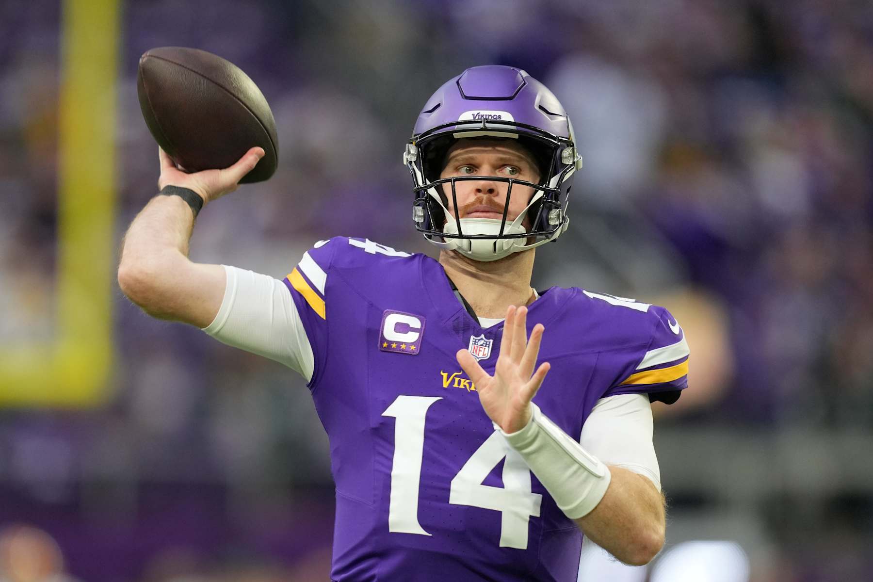 MINNEAPOLIS, MINNESOTA - DECEMBER 29: Sam Darnold #14 of the Minnesota Vikings warms up prior to a game against the Green Bay Packers at U.S. Bank Stadium on December 29, 2024 in Minneapolis, Minnesota. (Photo by Brace Hemmelgarn/Getty Images)