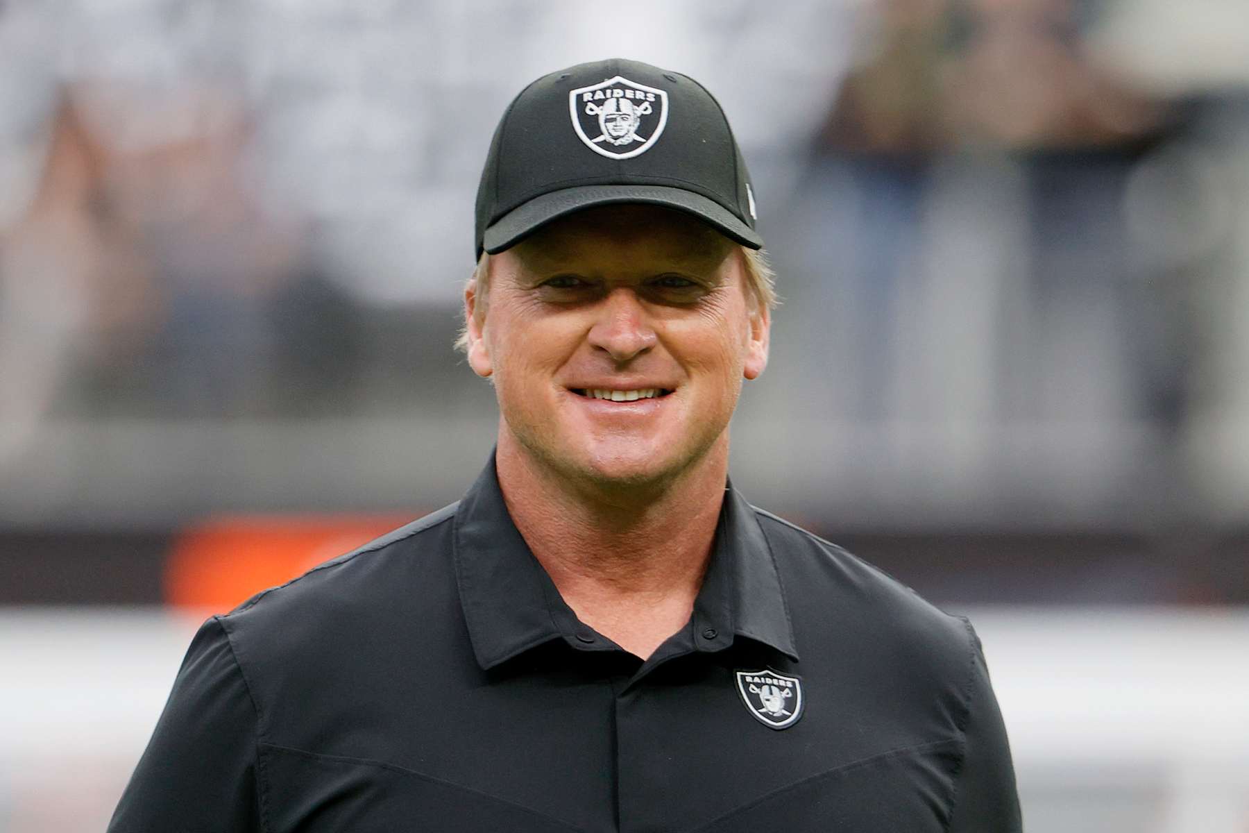 LAS VEGAS, NEVADA - OCTOBER 10: Head coach John Gruden of the Las Vegas Raiders looks on before a game against the Chicago Bears at Allegiant Stadium on October 10, 2021 in Las Vegas, Nevada. (Photo by Ethan Miller/Getty Images)