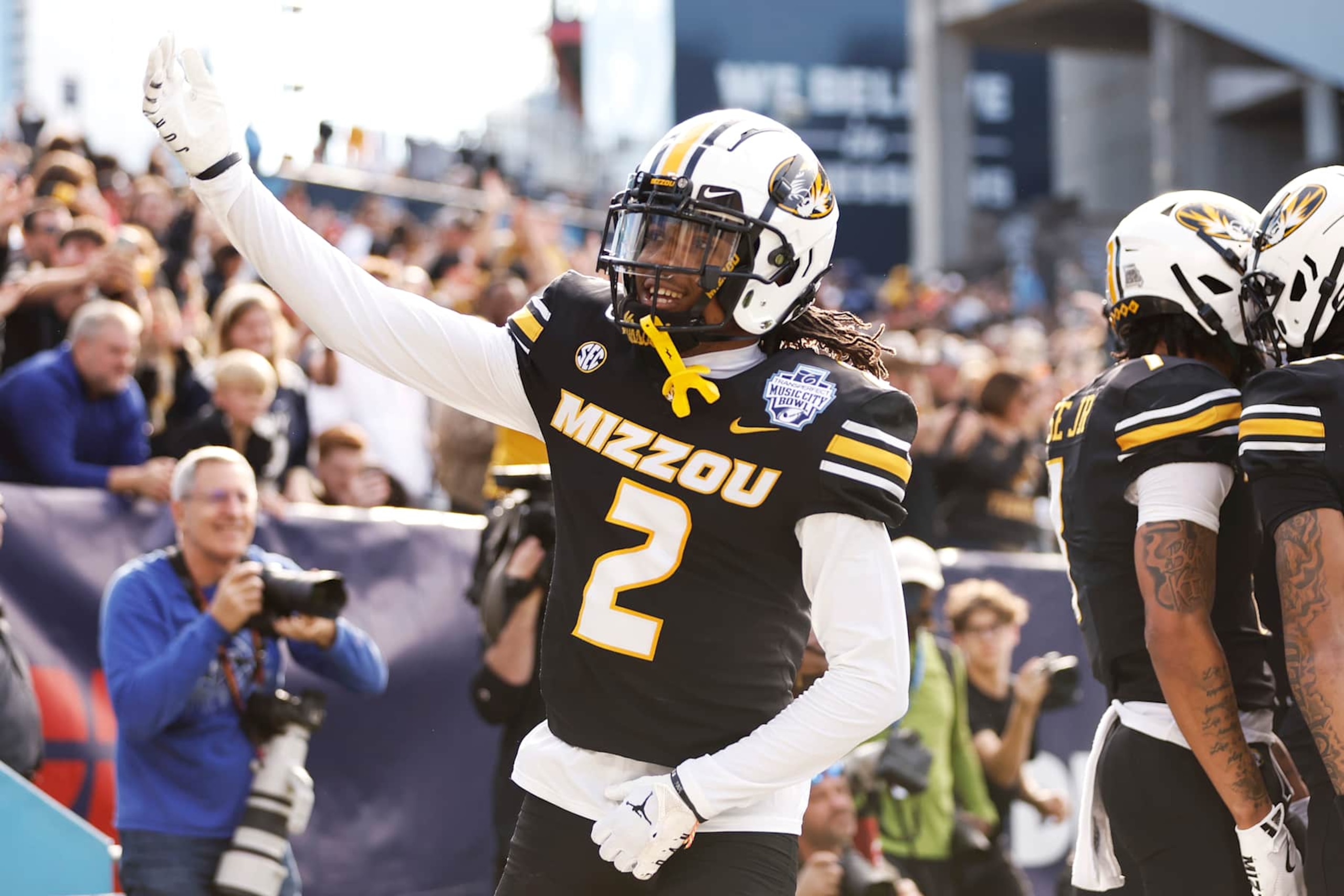 NASHVILLE, TENNESSEE - DECEMBER 30: Marquis Johnson #2 of the Missouri Tigers celebrates after a touchdown during the first half of the Transperfect Music City Bowl against the Iowa Hawkeyes at Nissan Stadium on December 30, 2024 in Nashville, Tennessee. (Photo by Johnnie Izquierdo/Getty Images) NASHVILLE, TENNESSEE - DECEMBER 30: Marquis Johnson #2 of the Missouri Tigers celebrates after a touchdown during the first half of the Transperfect Music City Bowl against the Iowa Hawkeyes at Nissan Stadium on December 30, 2024 in Nashville, Tennessee. (Photo by Johnnie Izquierdo/Getty Images)