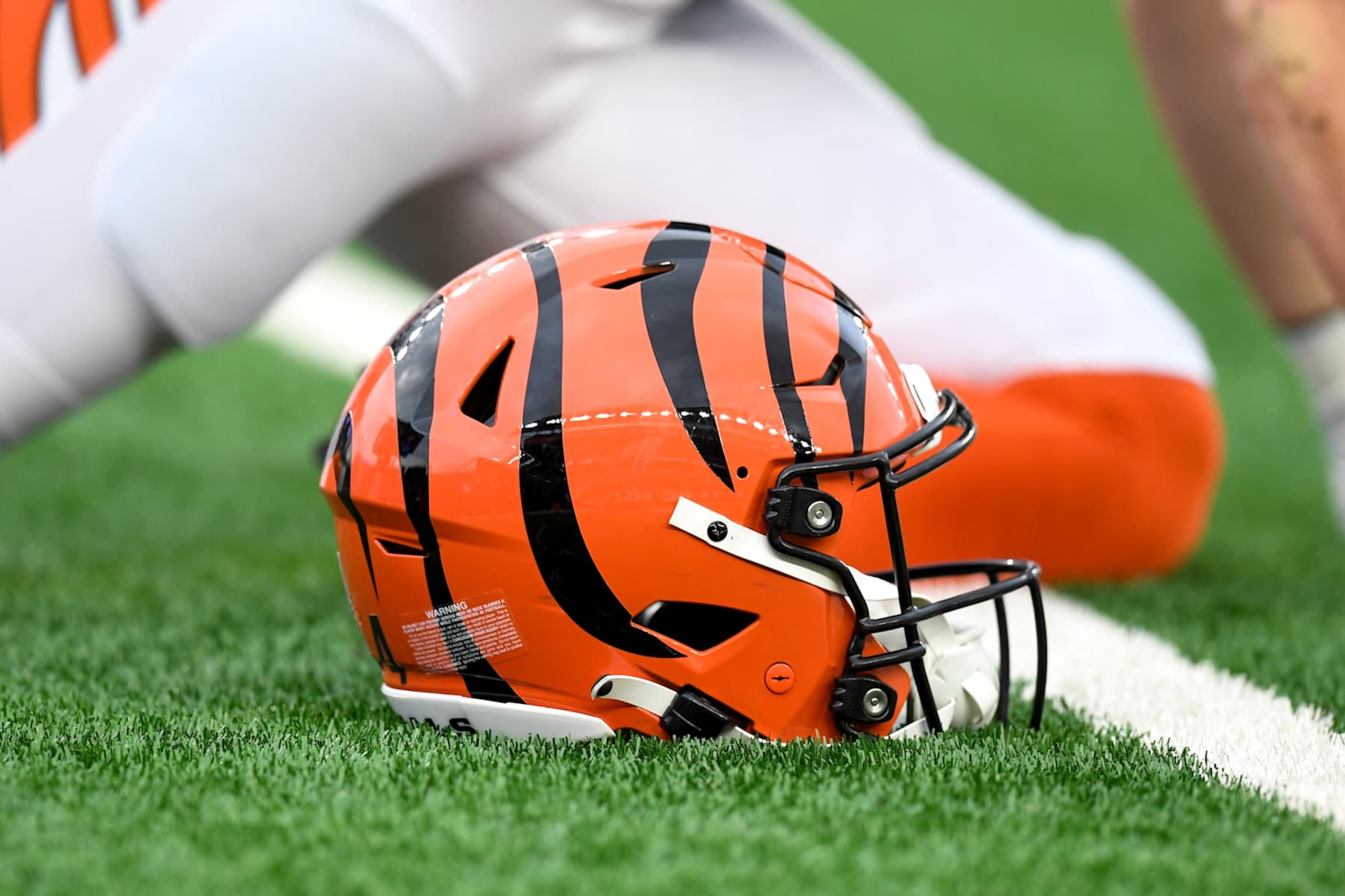 CINCINNATI, OH - DECEMBER 28: A Cincinnati Bengals helmet sits on the field before the NFL football game between the Denver Broncos and the Cincinnati Bengals on December 28, 2024, at Paycor Stadium in Cincinnati, Ohio. (Photo by Michael Allio/Icon Sportswire via Getty Images)