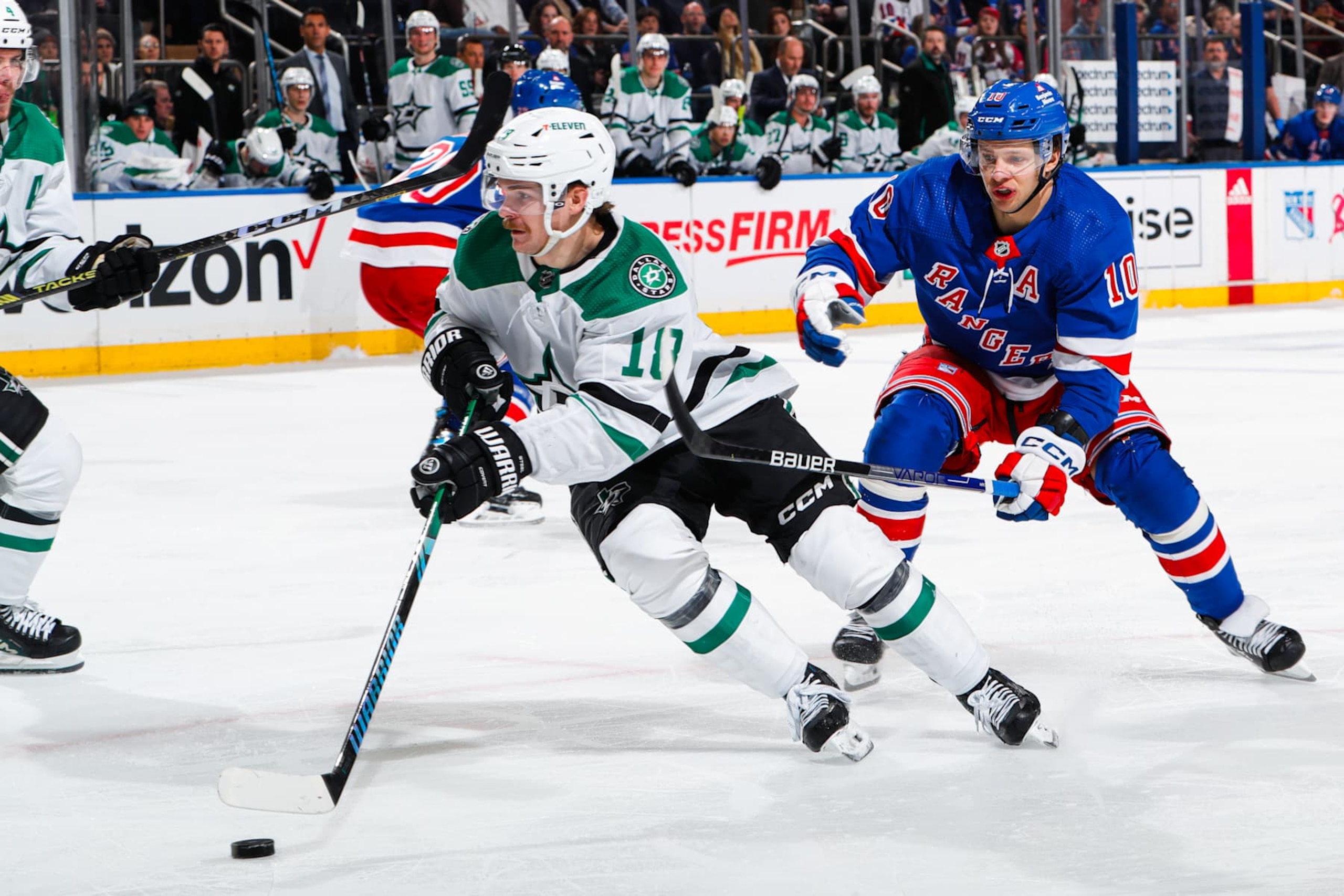 NEW YORK, NEW YORK - FEBRUARY 20: Logan Stankoven #11 of the Dallas Stars skates with the puck against Artemi Panarin #10 of the New York Rangers at Madison Square Garden on February 20, 2024 in New York City. (Photo by Jared Silber/NHLI via Getty Images) NEW YORK, NEW YORK - FEBRUARY 20: Logan Stankoven #11 of the Dallas Stars skates with the puck against Artemi Panarin #10 of the New York Rangers at Madison Square Garden on February 20, 2024 in New York City. (Photo by Jared Silber/NHLI via Getty Images)