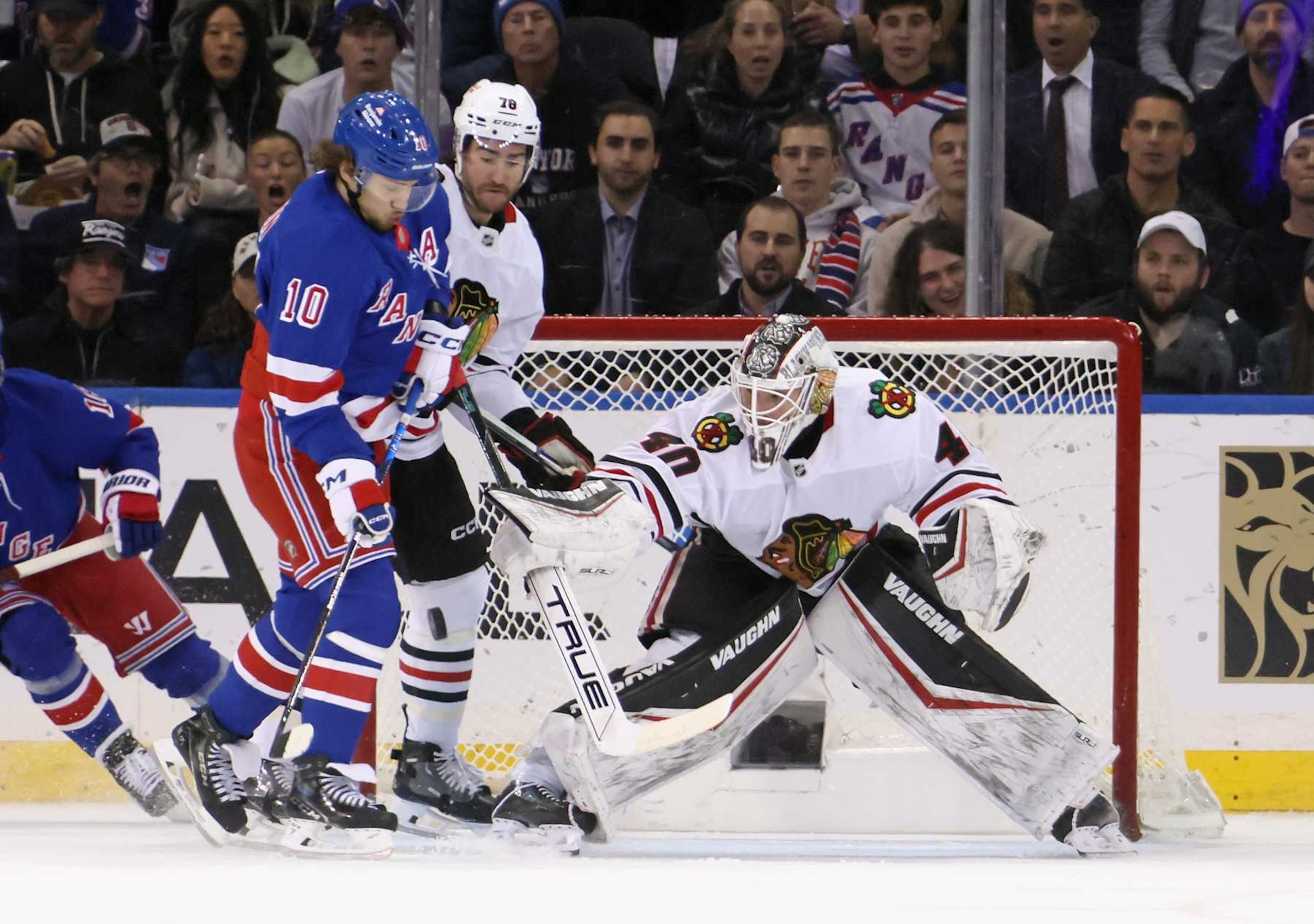 NEW YORK, NEW YORK - DECEMBER 09: Arvid Soderblom #40 of the Chicago Blackhawks makes a first period blocker save as Artemi Panarin #10 of the New York Rangers looks for a rebound at Madison Square Garden on December 09, 2024 in New York City. (Photo by Bruce Bennett/Getty Images) NEW YORK, NEW YORK - DECEMBER 09: Arvid Soderblom #40 of the Chicago Blackhawks makes a first period blocker save as Artemi Panarin #10 of the New York Rangers looks for a rebound at Madison Square Garden on December 09, 2024 in New York City. (Photo by Bruce Bennett/Getty Images)