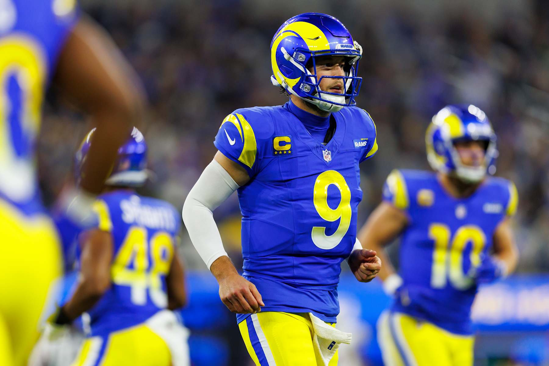 INGLEWOOD, CALIFORNIA - DECEMBER 28: Quarterback Matthew Stafford #9 of the Los Angeles Rams jogs back to the sidelines during the first half of an NFL football game against the Arizona Cardinals, at SoFi Stadium on December 28, 2024 in Inglewood, California. (Photo by Brooke Sutton/Getty Images)