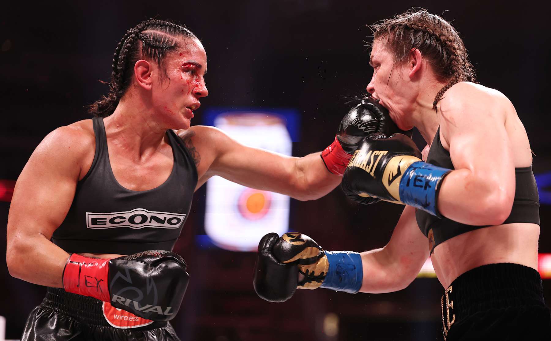 ARLINGTON, TEXAS - NOVEMBER 15:  Amanda Serrano punches Katie Taylor during their fight  LIVE On Netflix: Jake Paul vs. Mike Tyson at AT&T Stadium on November 15, 2024 in Arlington, Texas  (Photo by Al Bello/Getty Images for Netflix © 2024)