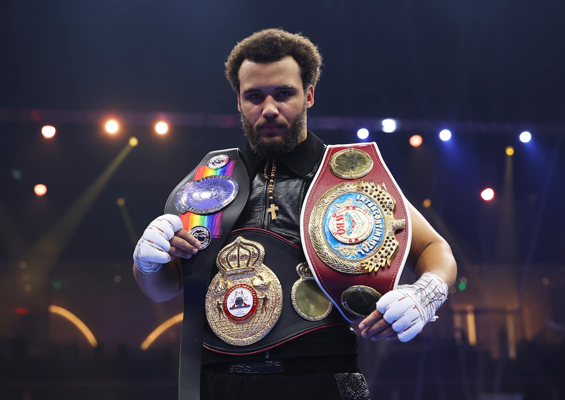 RIYADH, SAUDI ARABIA - DECEMBER 21: Moses Itauma celebrates victory with his belts following the WBO Inter-Continental, WBA International and Commonwealth Silver Heavyweight titles' fight between Moses Itauma and Demsey McKean as part of Oleksandr Usyk v Tyson Fury 2, Reignited card at Kingdom Arena on December 21, 2024 in Riyadh, Saudi Arabia. (Photo by Richard Pelham/Getty Images)