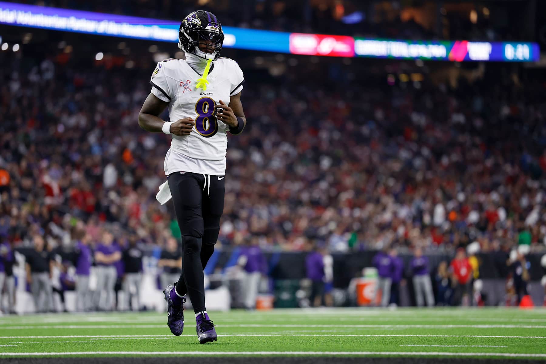 HOUSTON, TEXAS - DECEMBER 25: Lamar Jackson #8 of the Baltimore Ravens takes the field in the second quarter against the Houston Texans at NRG Stadium on December 25, 2024 in Houston, Texas. (Photo by Tim Warner/Getty Images)