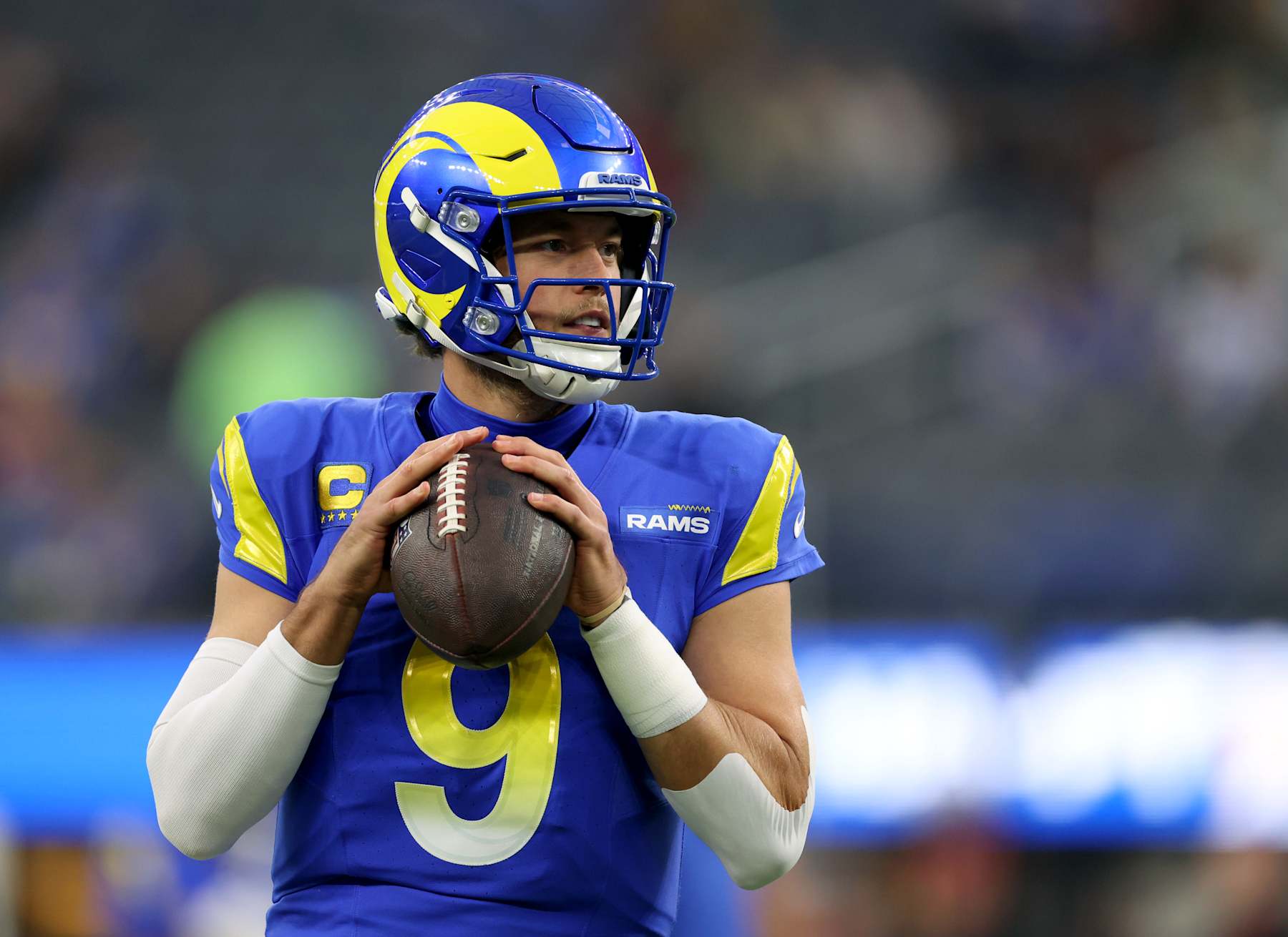 INGLEWOOD, CALIFORNIA - DECEMBER 28: Matthew Stafford #9 of the Los Angeles Rams during warm up before the game against the Arizona Cardinals at SoFi Stadium on December 28, 2024 in Inglewood, California. (Photo by Harry How/Getty Images)