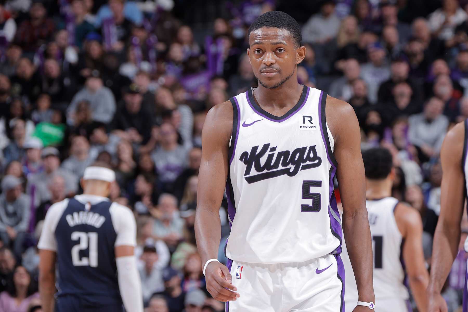 SACRAMENTO, CA - DECEMBER 30:  De'Aaron Fox #5 of the Sacramento Kings looks on during the game against the Dallas Mavericks on December 30, 2024 at Golden 1 Center in Sacramento, California. NOTE TO USER: User expressly acknowledges and agrees that, by downloading and or using this Photograph, user is consenting to the terms and conditions of the Getty Images License Agreement. Mandatory Copyright Notice: Copyright 2024 NBAE (Photo by Rocky Widner/NBAE via Getty Images)