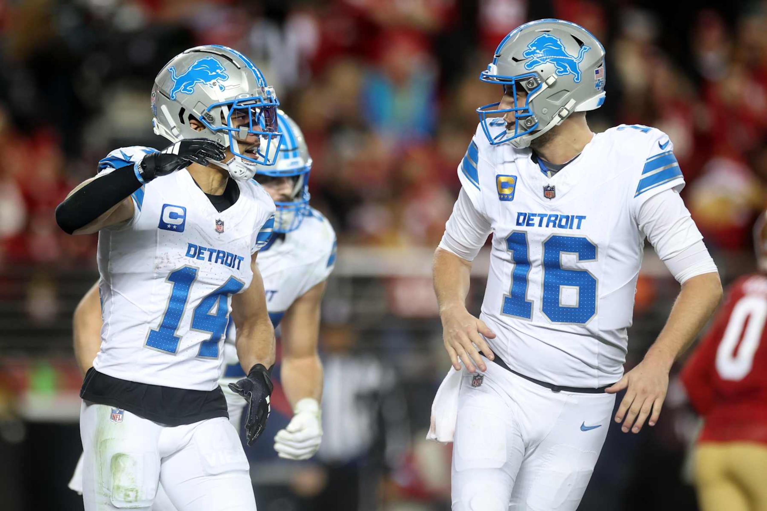 Lions WR Amon-Ra St. Brown (left) and QB Jared Goff (right)