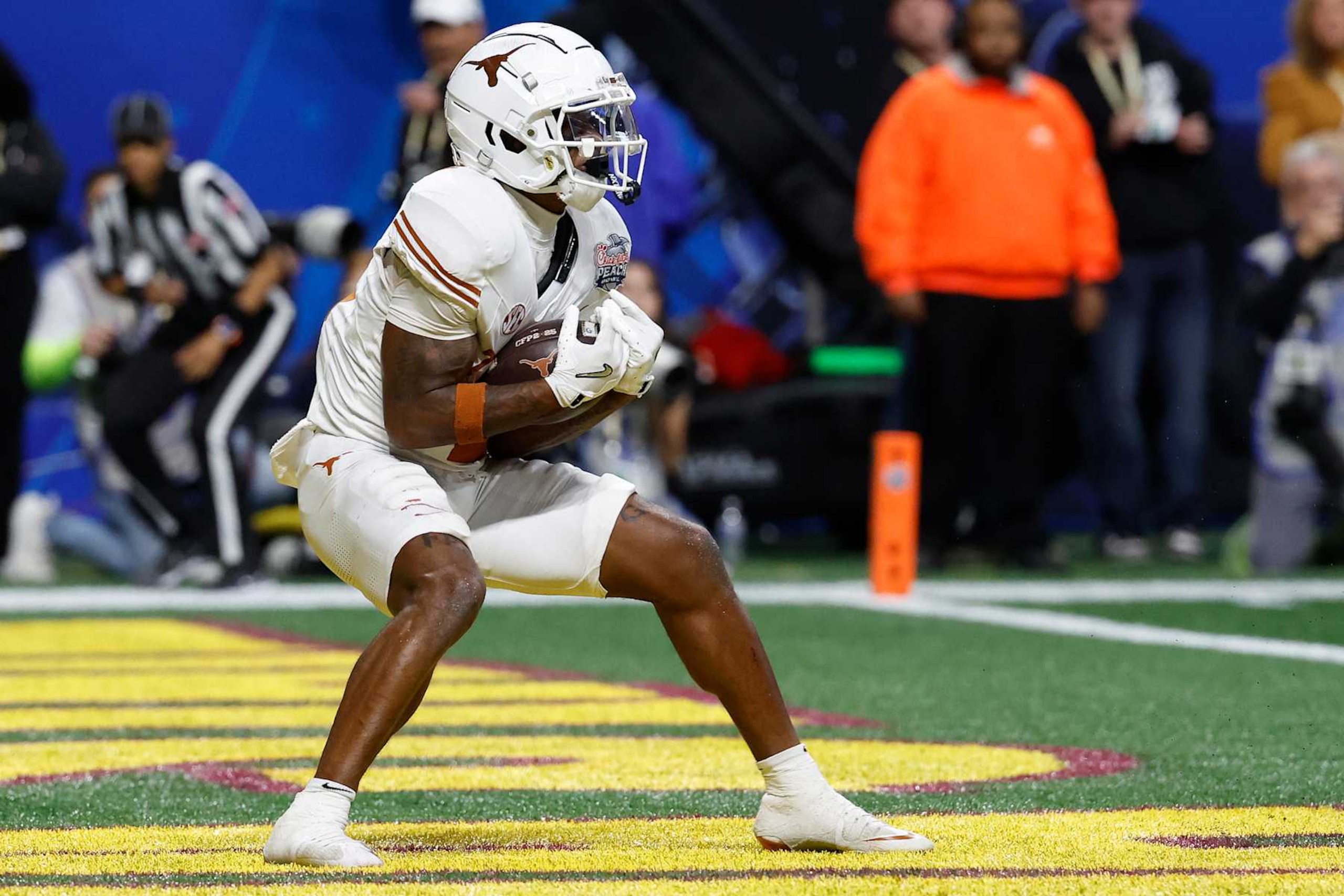 ATLANTA, GEORGIA - JANUARY 01: Matthew Golden #2 of the Texas Longhorns catches a pass for a touchdown during overtime against the Arizona State Sun Devils in the Chick-fil-A Peach Bowl at Mercedes-Benz Stadium on January 01, 2025 in Atlanta, Georgia.  (Photo by Butch Dill/Getty Images)