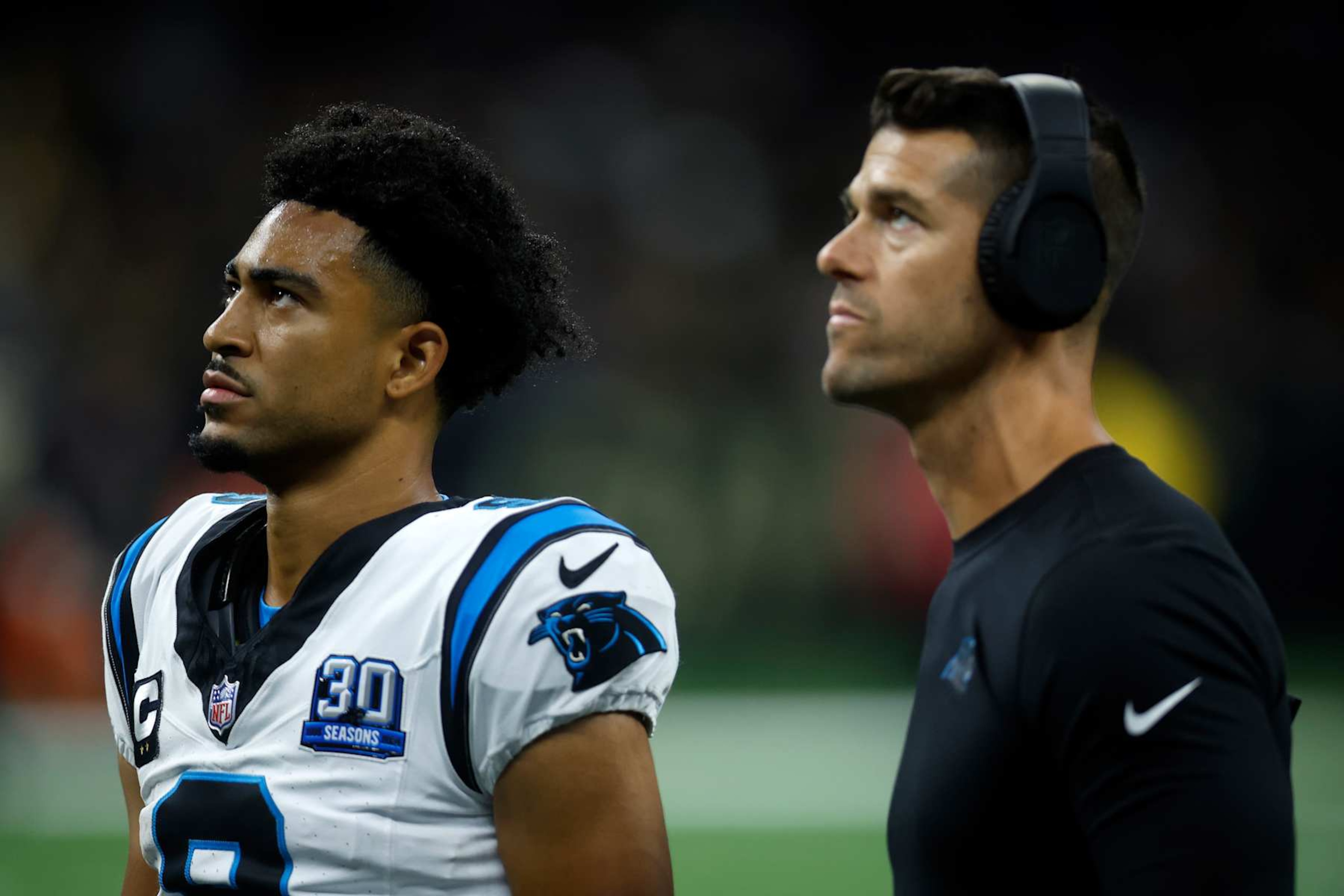 NEW ORLEANS, LOUISIANA - SEPTEMBER 08: Head coach of the Carolina Panthers Dave Canales talks with Bryce Young #9 of the Carolina Panthers against the New Orleans Saints at Caesars Superdome on September 08, 2024 in New Orleans, Louisiana. (Photo by Chris Graythen/Getty Images)