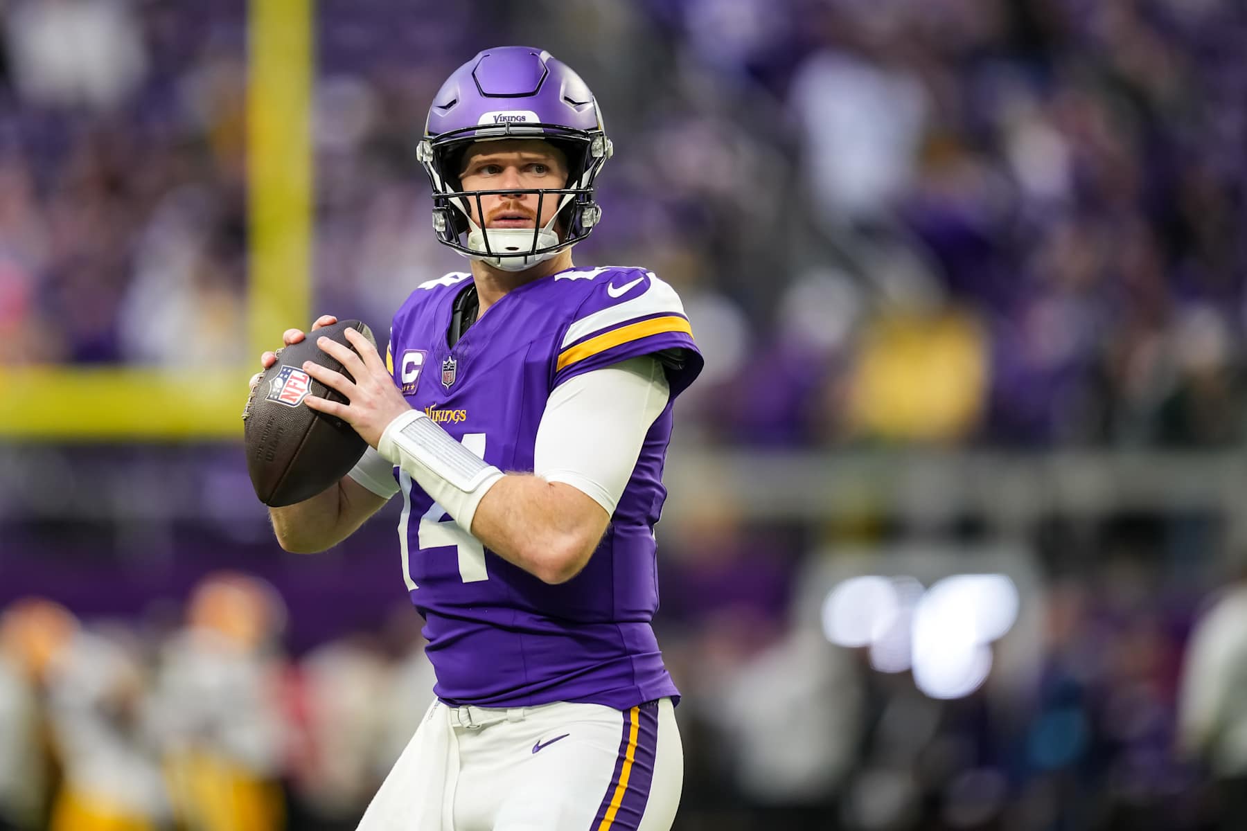 MINNEAPOLIS, MINNESOTA - DECEMBER 29: Sam Darnold #14 of the Minnesota Vikings looks on prior to a game between the Minnesota Vikings and Green Bay Packers at U.S. Bank Stadium on December 29, 2024 in Minneapolis, Minnesota. (Photo by Brace Hemmelgarn/Getty Images)