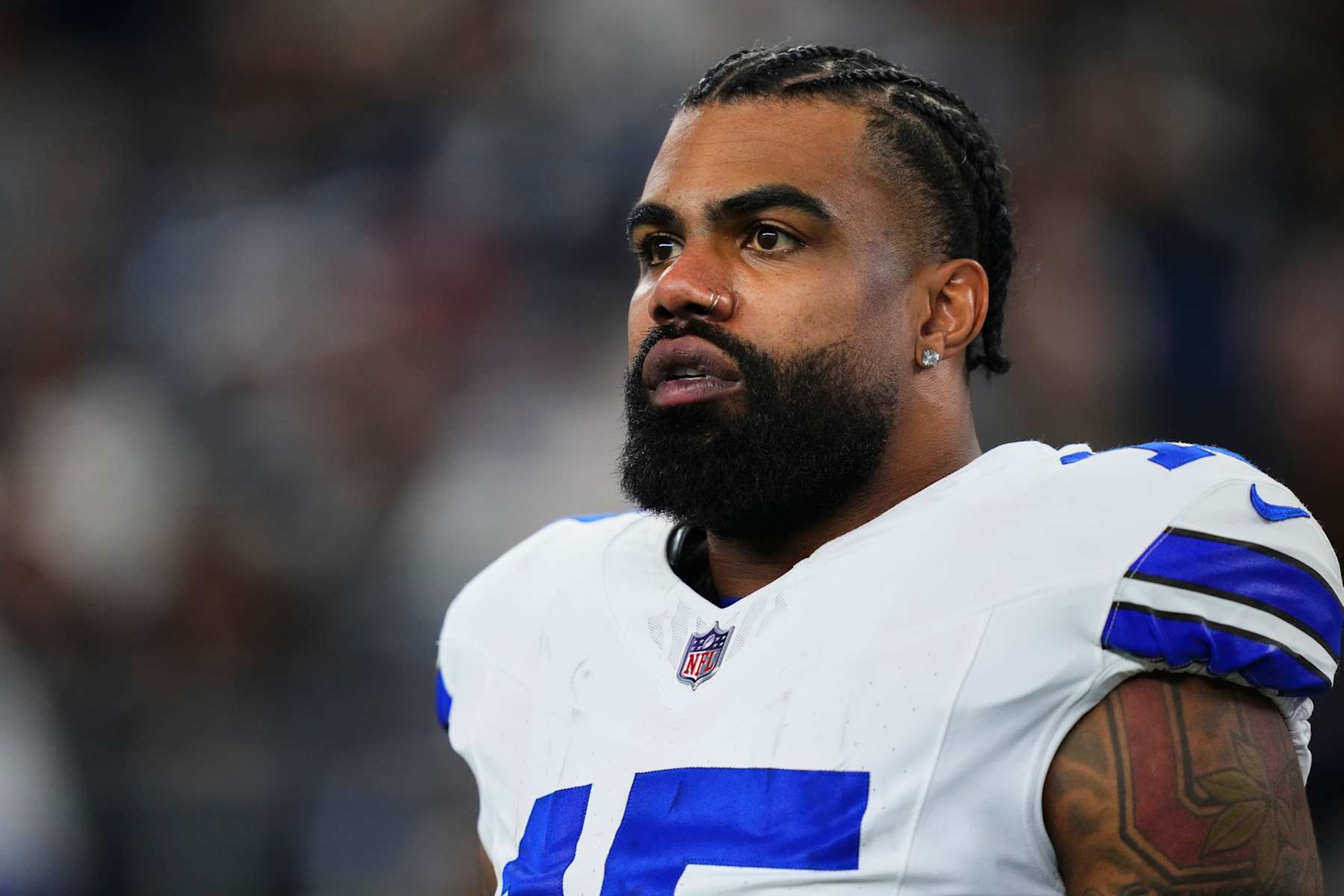 ARLINGTON, TX - DECEMBER 22: Ezekiel Elliott #15 of the Dallas Cowboys looks on before kickoff against the Tampa Bay Buccaneers during an NFL football game at AT&T Stadium on December 22, 2024 in Arlington, Texas. (Photo by Cooper Neill/Getty Images)