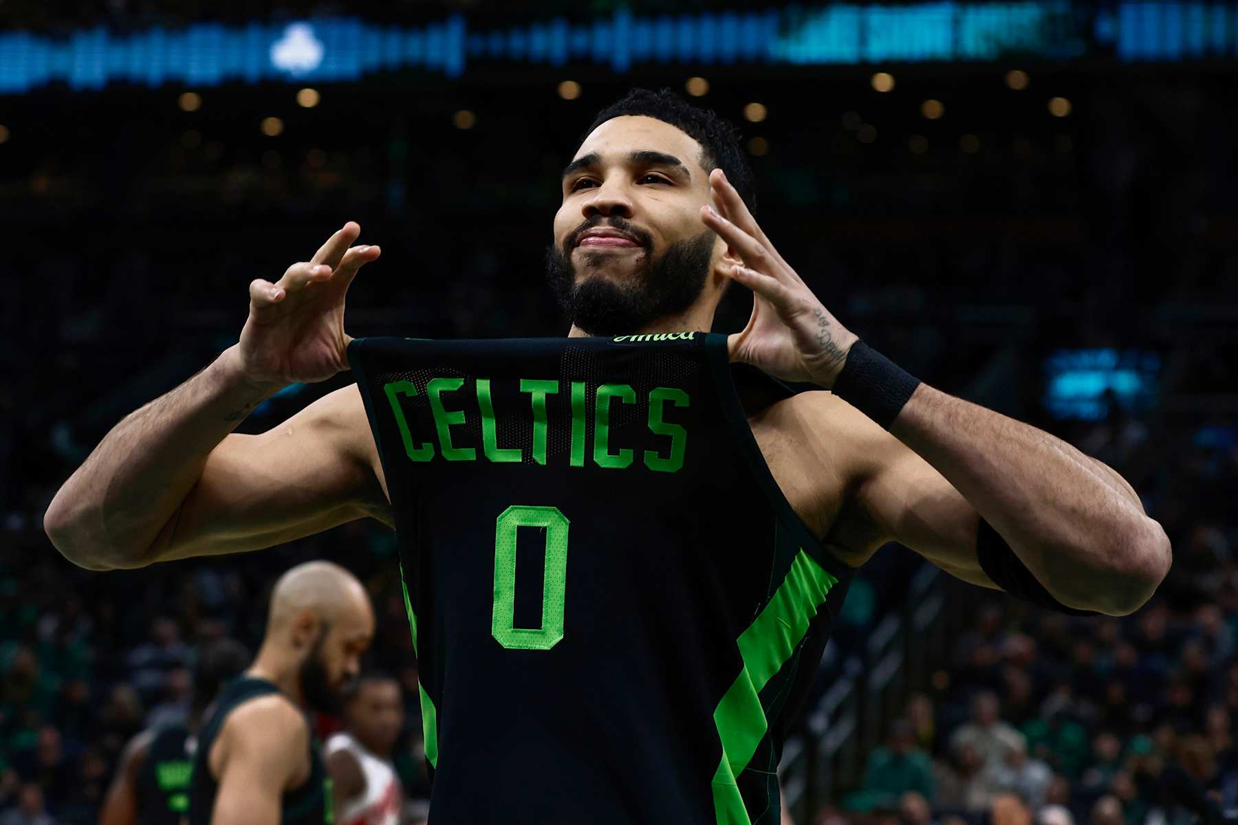 BOSTON, MA - DECEMBER 31: Jayson Tatum #0 of the Boston Celtics shows off his jersey to the fans before their game against the Toronto Raptors at TD Garden on December 31, 2024 in Boston, Massachusetts. NOTE TO USER: User expressly acknowledges and agrees that, by downloading and/or using this Photograph, user is consenting to the terms and conditions of the Getty Images License Agreement. (Photo By Winslow Townson/Getty Images)