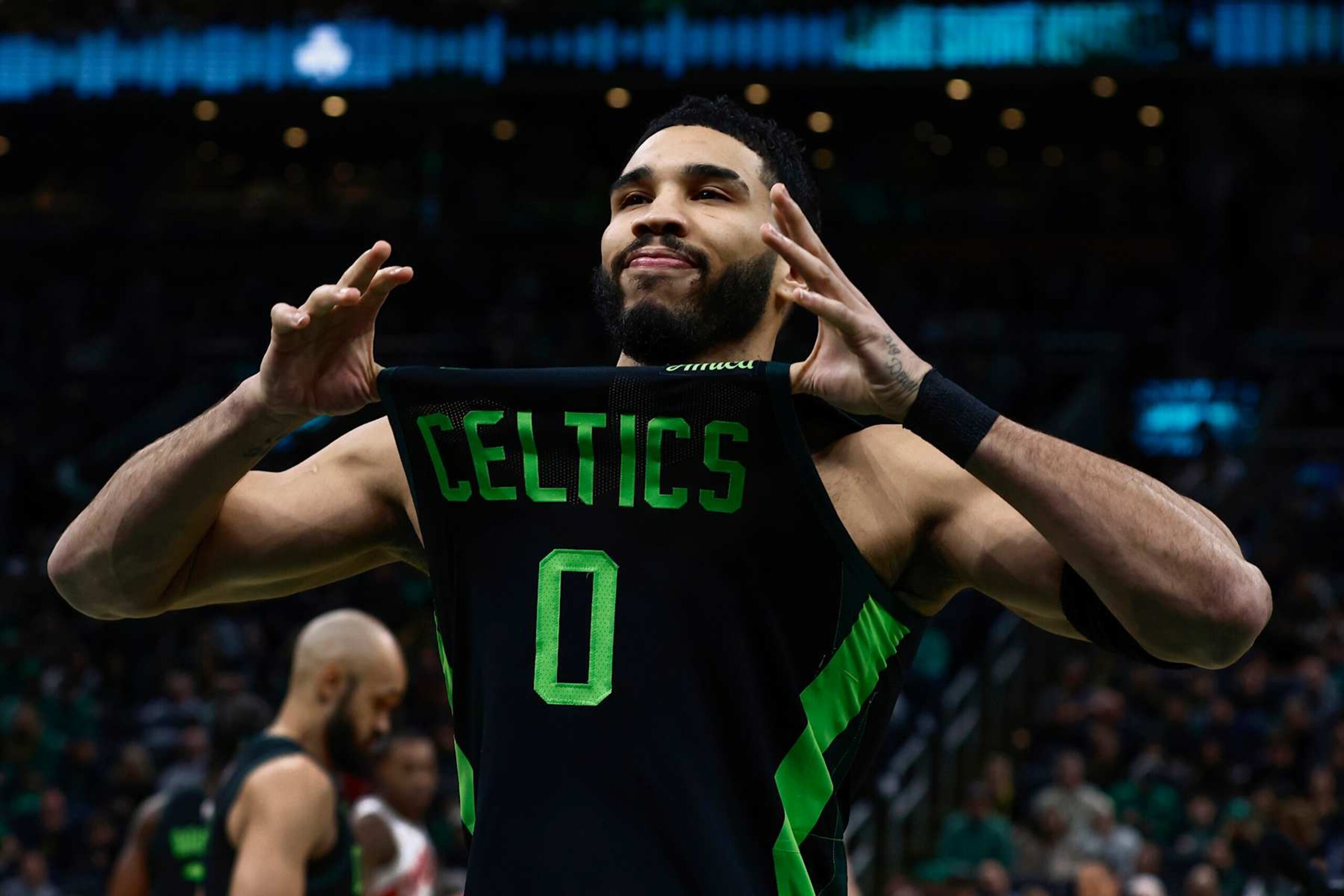 BOSTON, MA - DECEMBER 31: Jayson Tatum #0 of the Boston Celtics shows off his jersey to the fans before their game against the Toronto Raptors at TD Garden on December 31, 2024 in Boston, Massachusetts. NOTE TO USER: User expressly acknowledges and agrees that, by downloading and/or using this Photograph, user is consenting to the terms and conditions of the Getty Images License Agreement. (Photo By Winslow Townson/Getty Images) BOSTON, MA - DECEMBER 31: Jayson Tatum #0 of the Boston Celtics shows off his jersey to the fans before their game against the Toronto Raptors at TD Garden on December 31, 2024 in Boston, Massachusetts. NOTE TO USER: User expressly acknowledges and agrees that, by downloading and/or using this Photograph, user is consenting to the terms and conditions of the Getty Images License Agreement. (Photo By Winslow Townson/Getty Images)